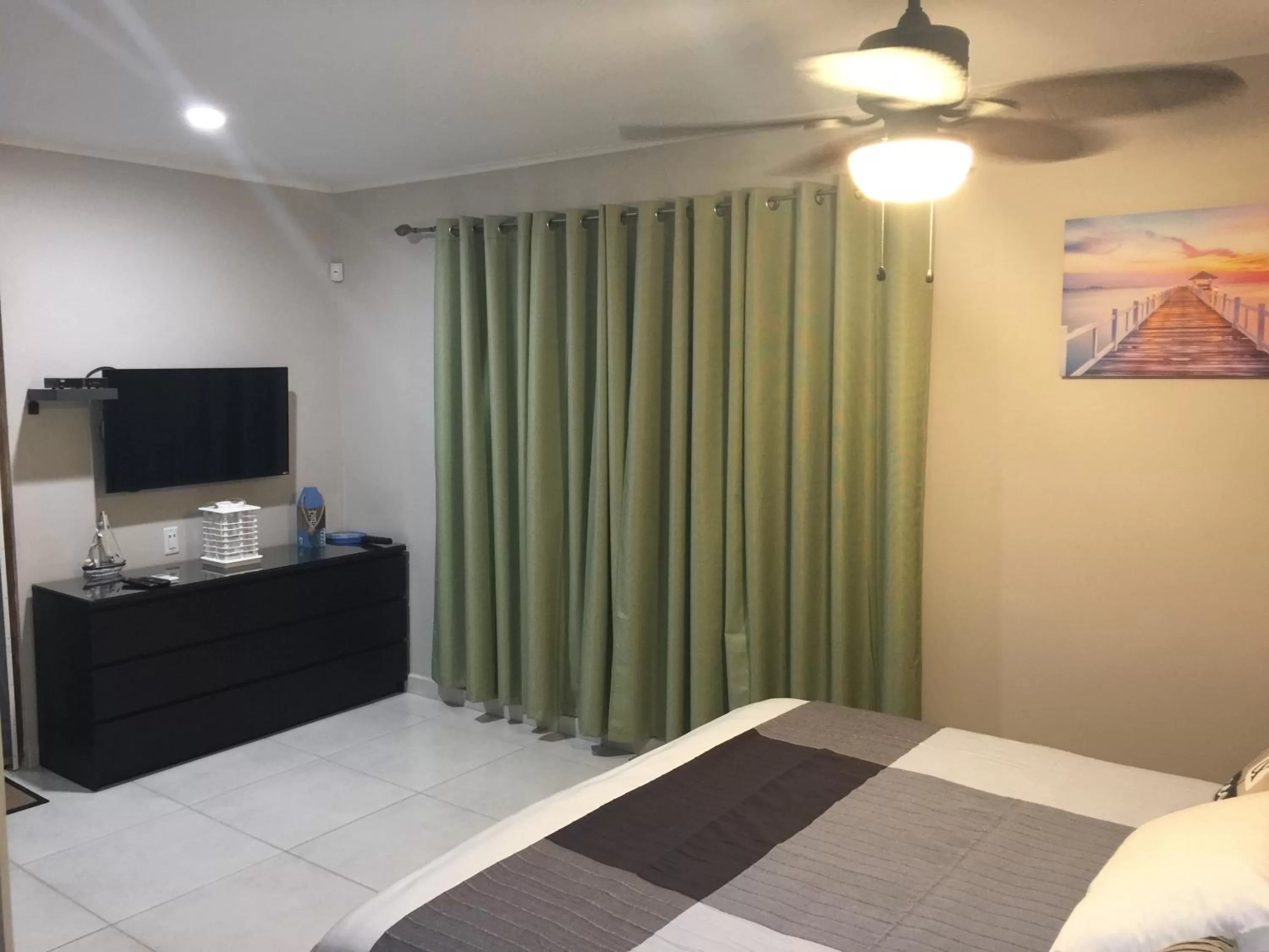 Bed in The Pier Beach Inn & Suites