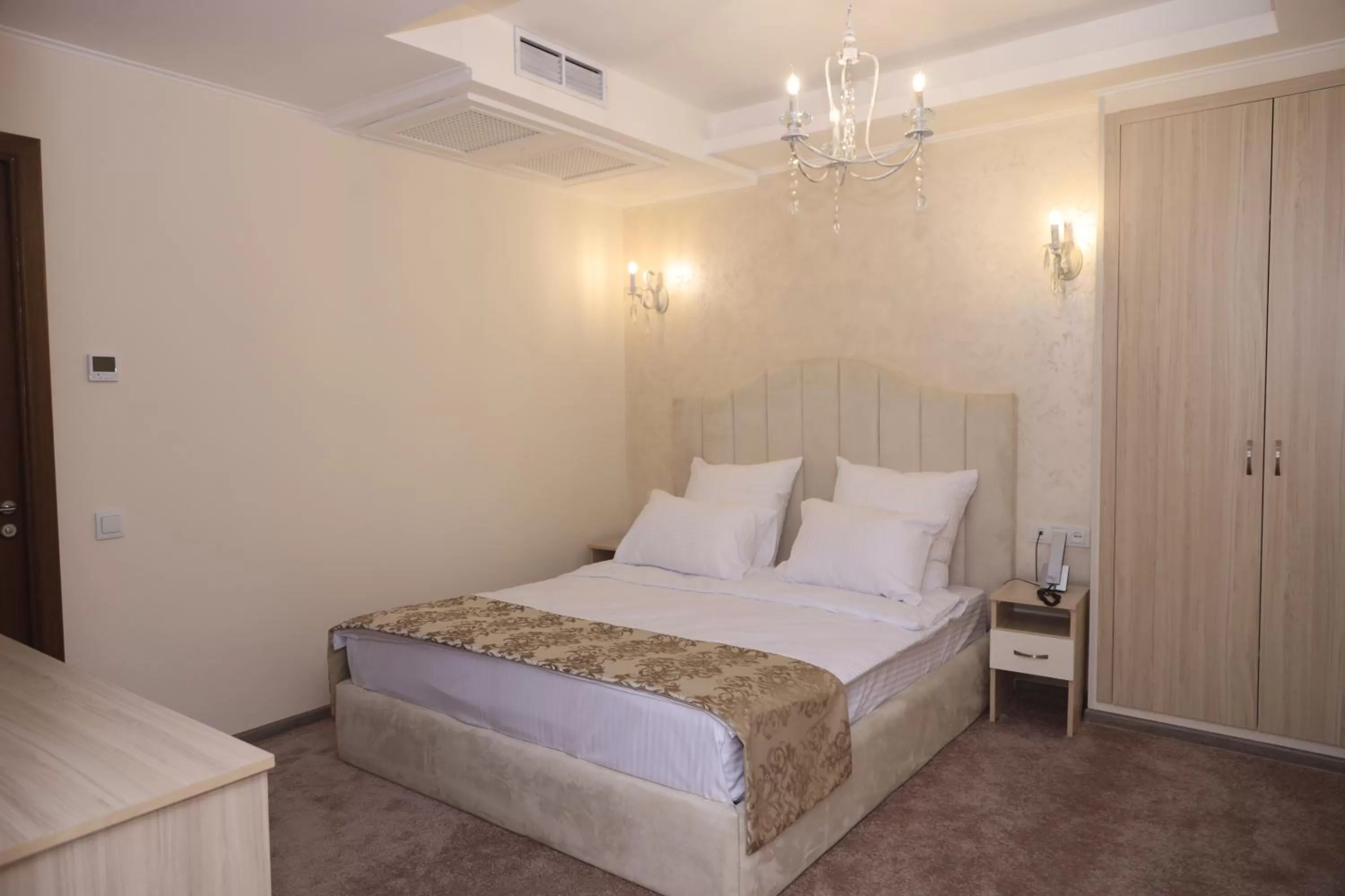 Bed in DeLin Hotel And Tours