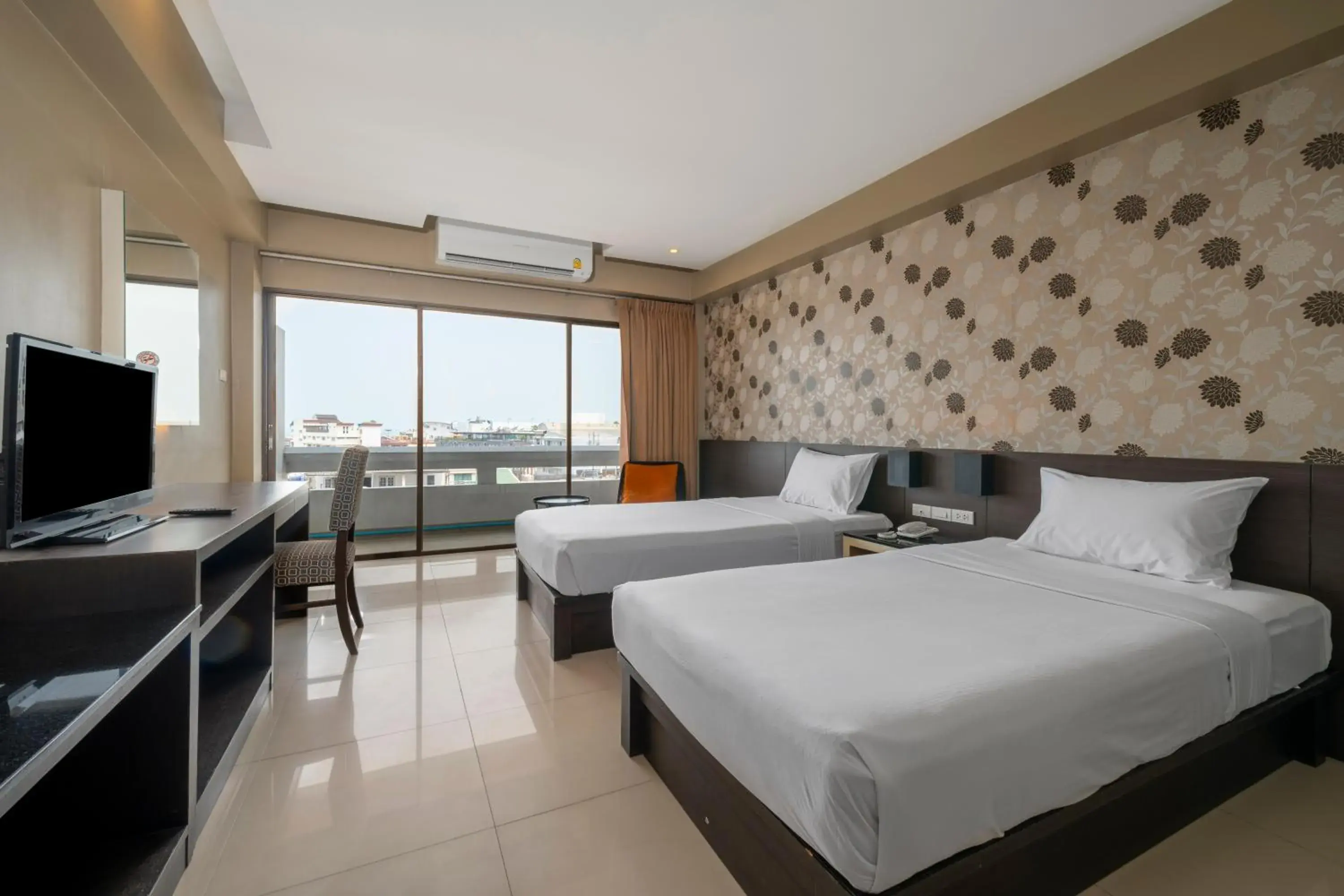 Bedroom in Welcome Plaza Hotel Pattaya