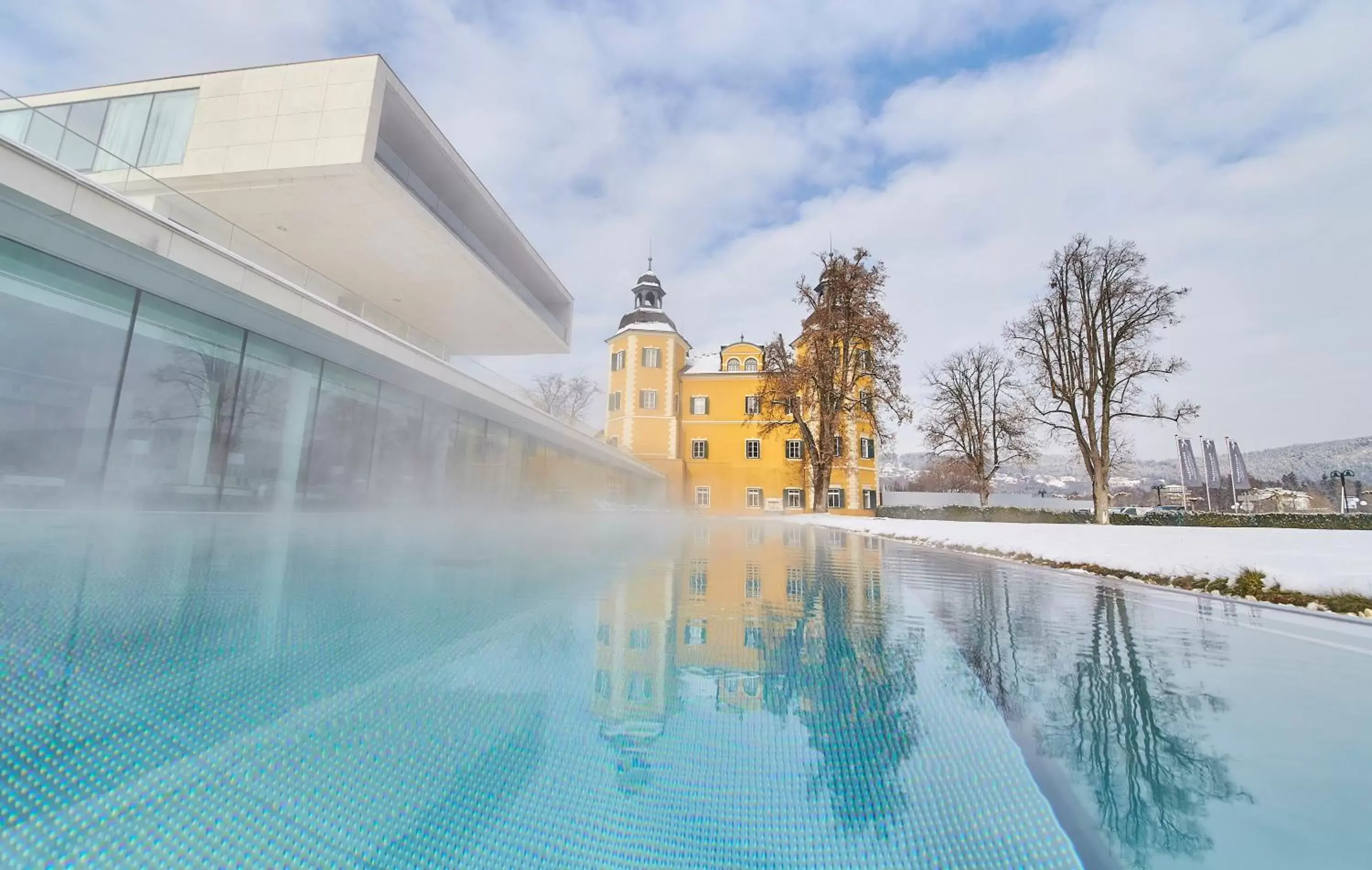 Property building, Swimming Pool in Falkensteiner Schlosshotel Velden – The Leading Hotels of the World