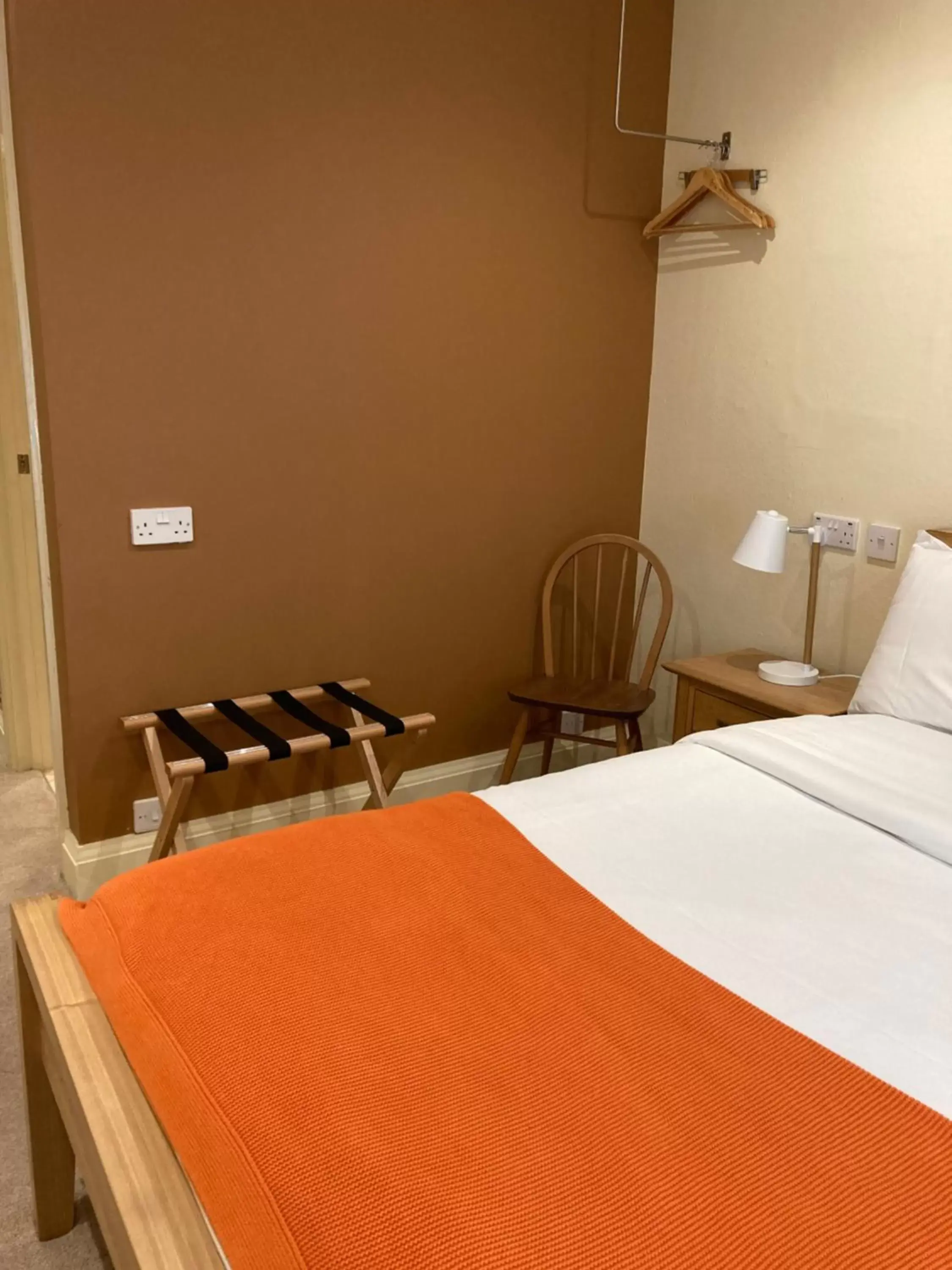 Bed in Newell Bistro and Rooms