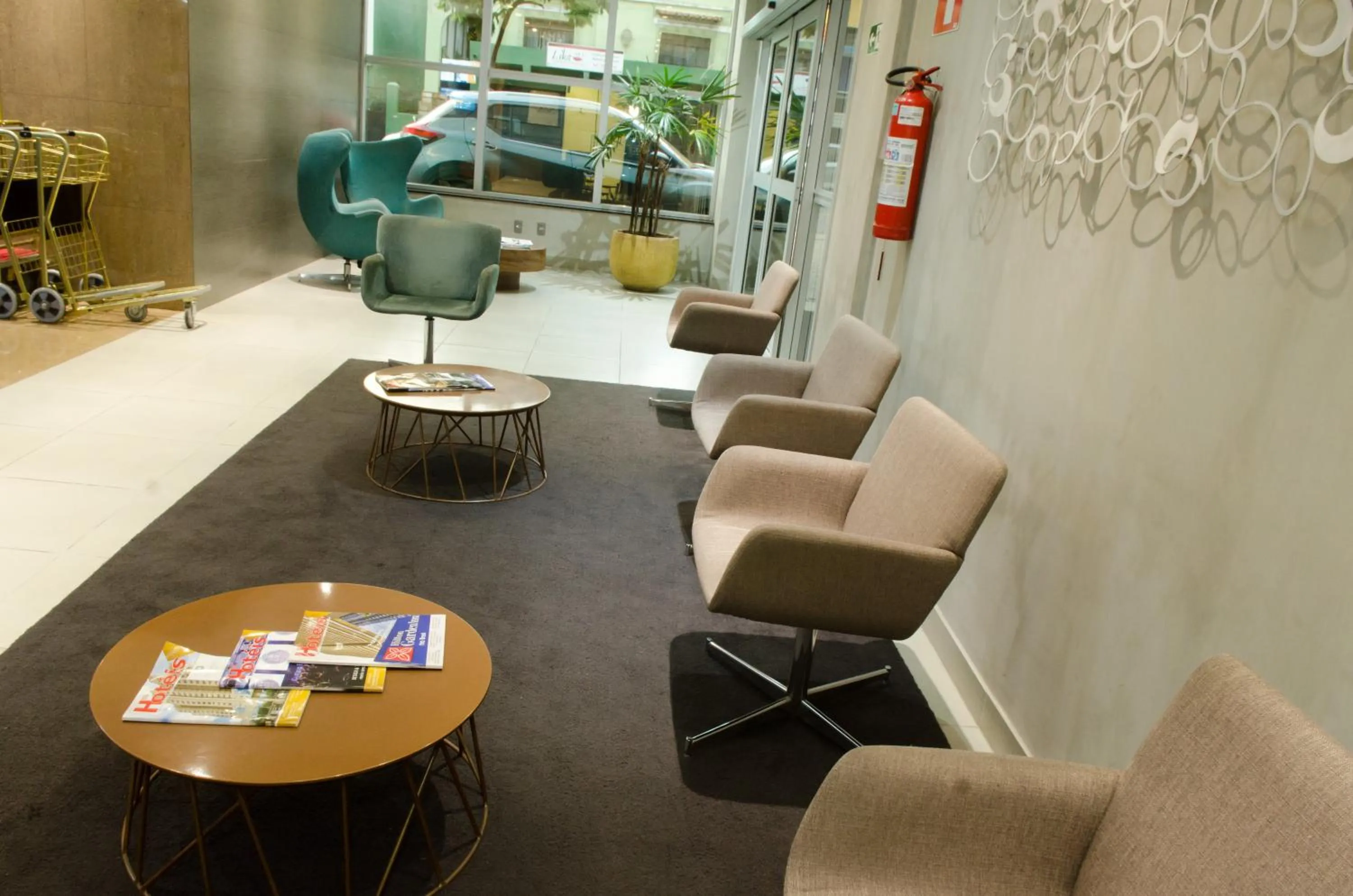 Lobby or reception in Ímpar Suítes Expominas