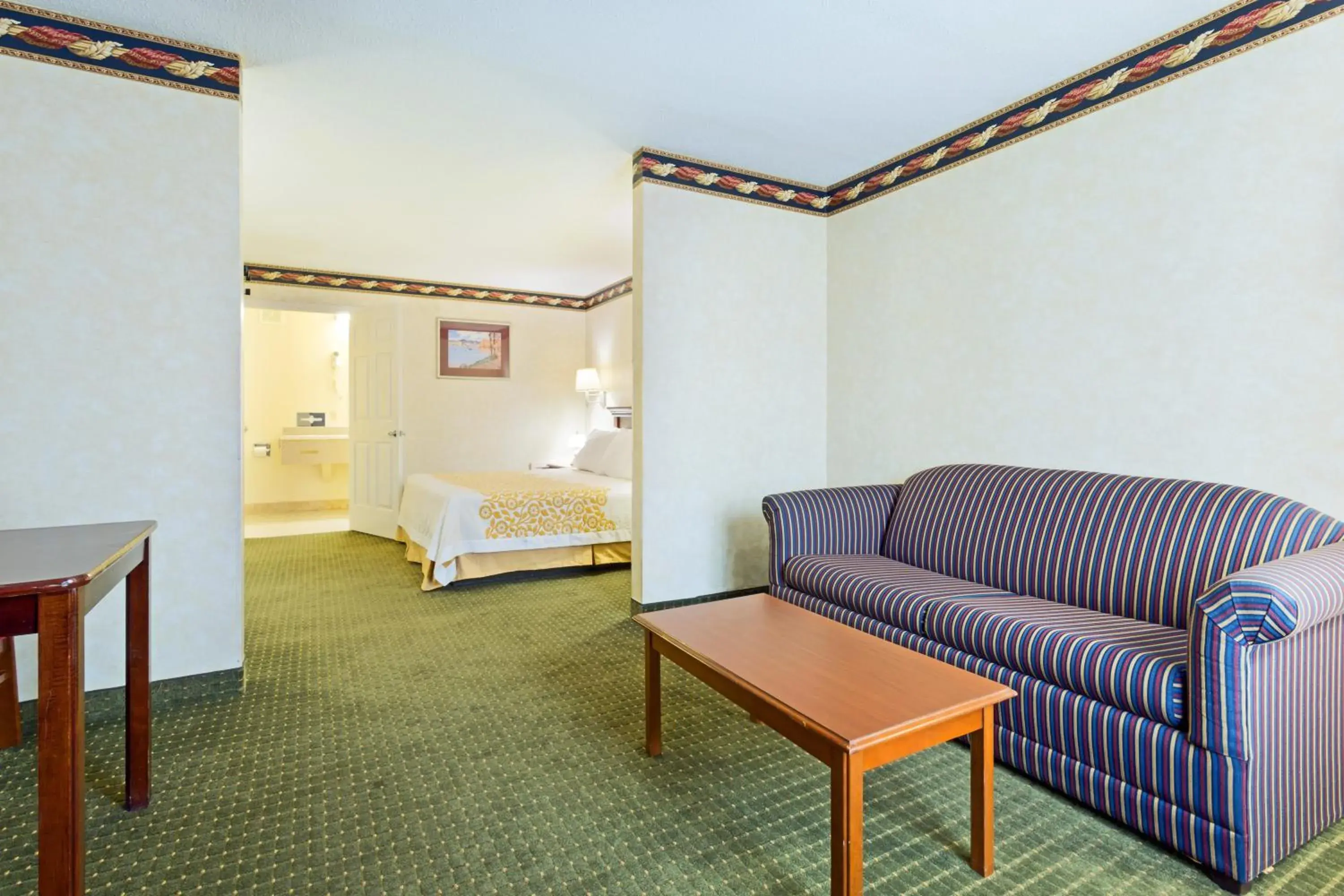 Seating area, Room Photo in Days Inn by Wyndham Clinton