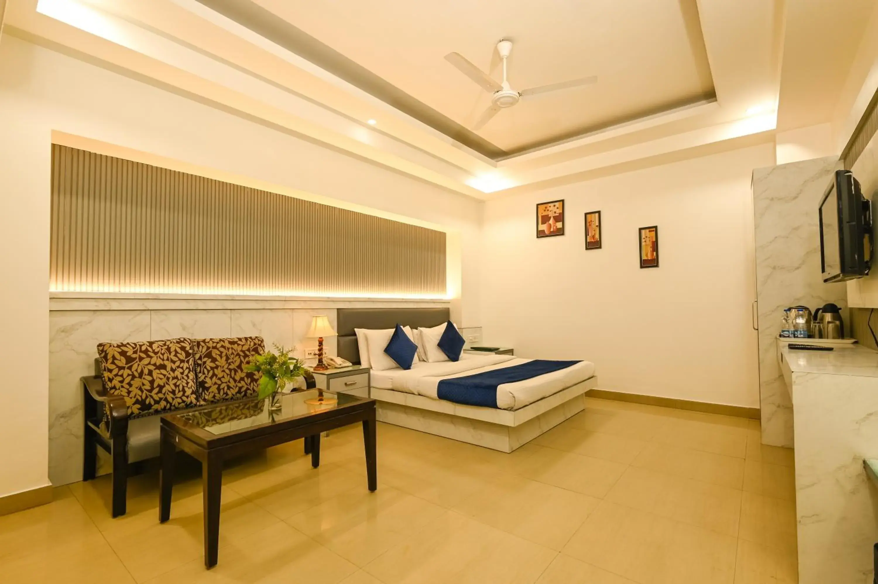 Photo of the whole room, Seating Area in Hotel Krishna Deluxe-By RCG Hotels