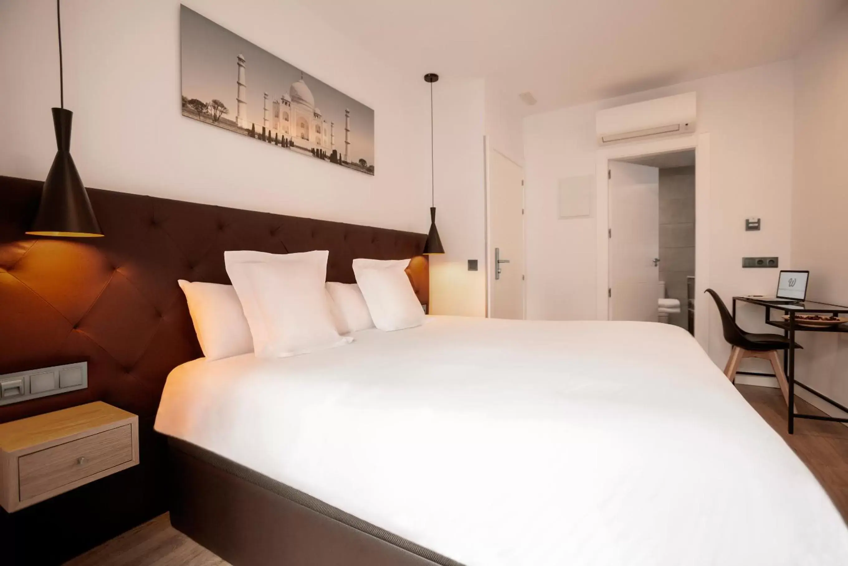 Bed in Woohoo Rooms Hortaleza