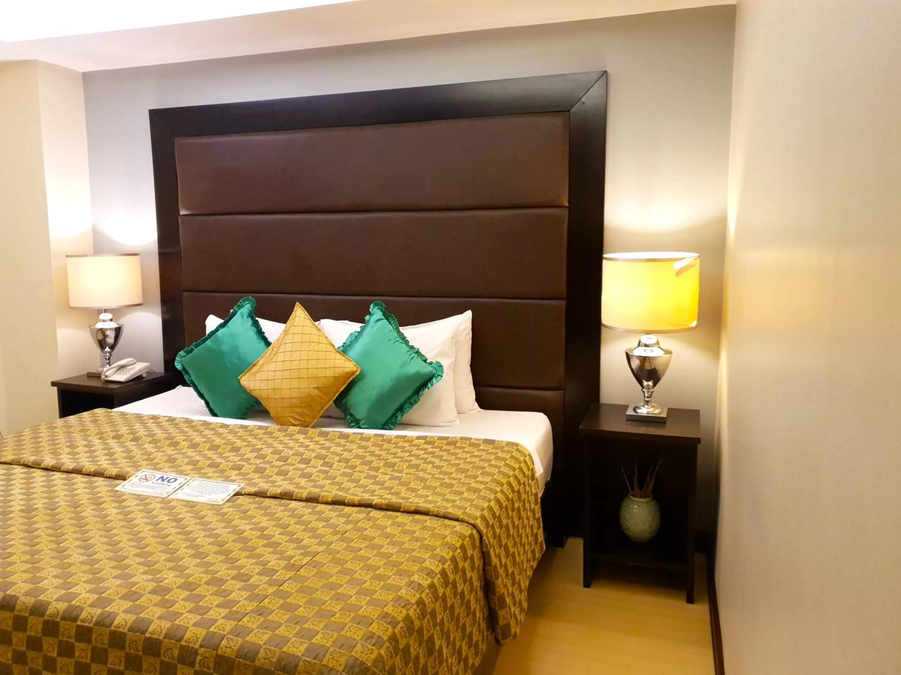 Bed in Festive Hotel Makati