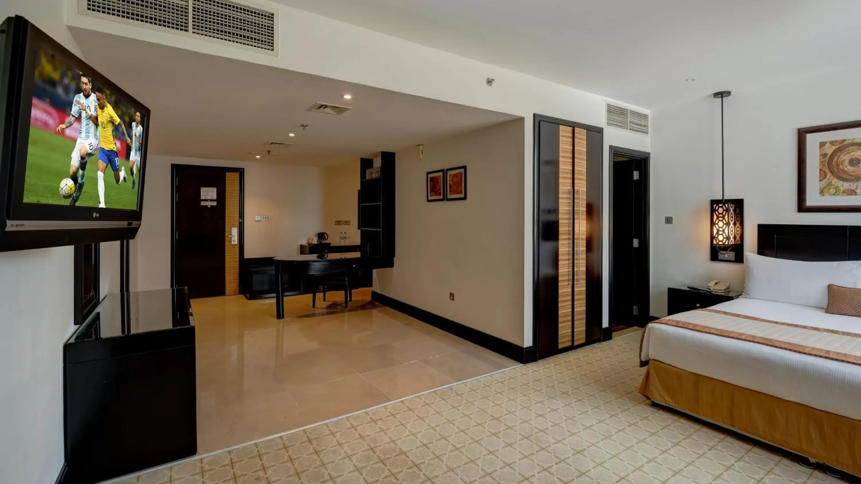 Photo of the whole room, TV/Entertainment Center in Holiday Inn Dubai Al Barsha, an IHG Hotel