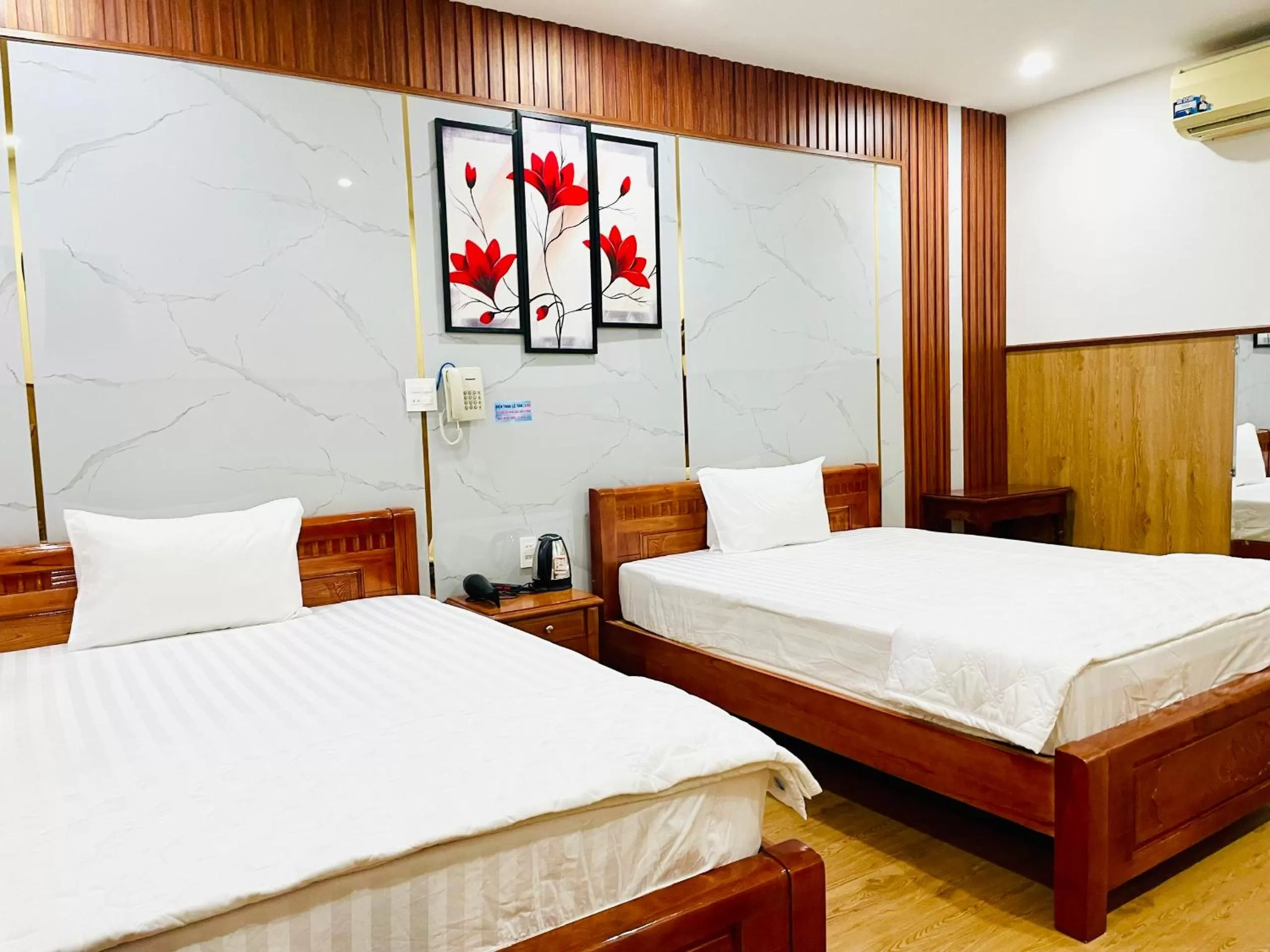 Bed in Nhu Y Hotel