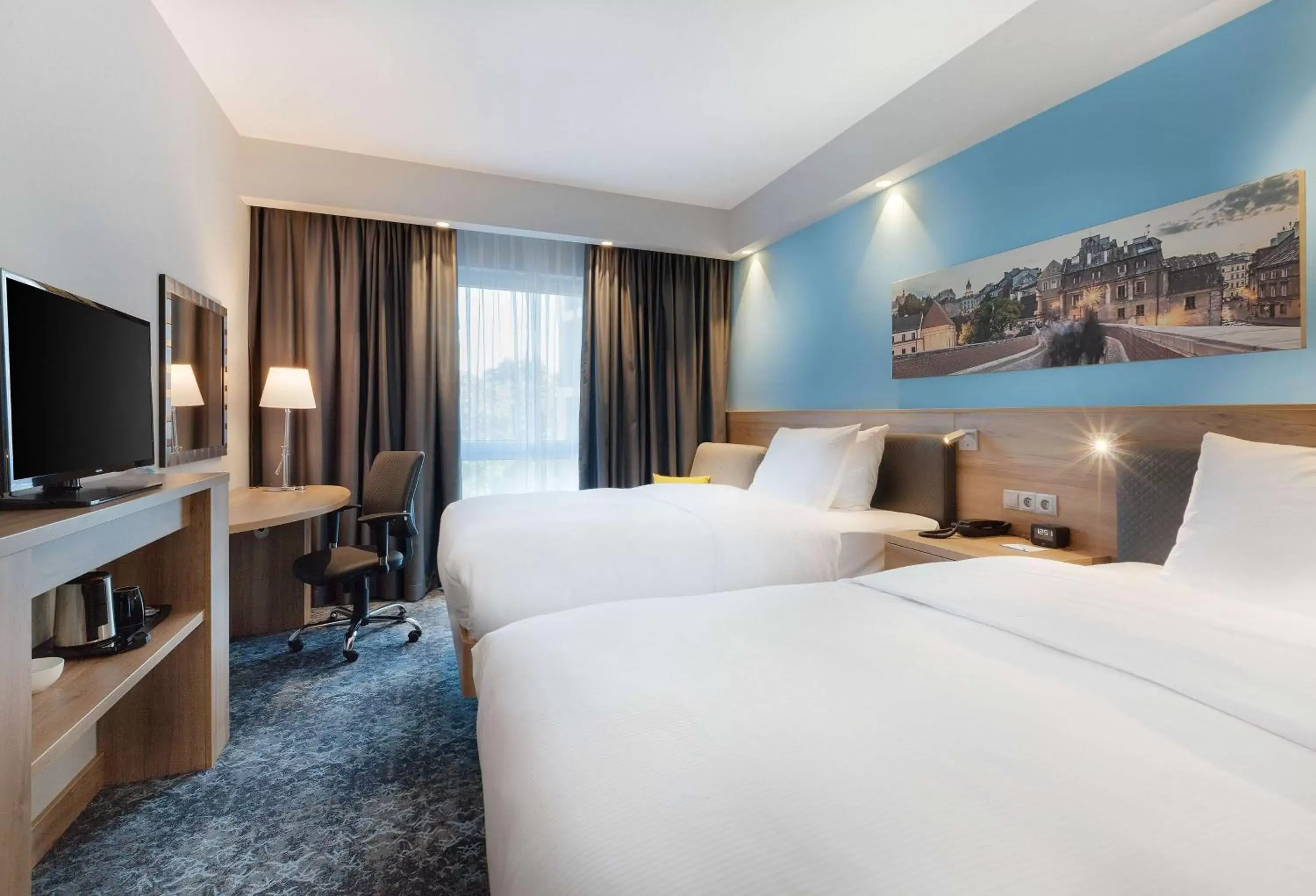 Bedroom in Hampton By Hilton Lublin