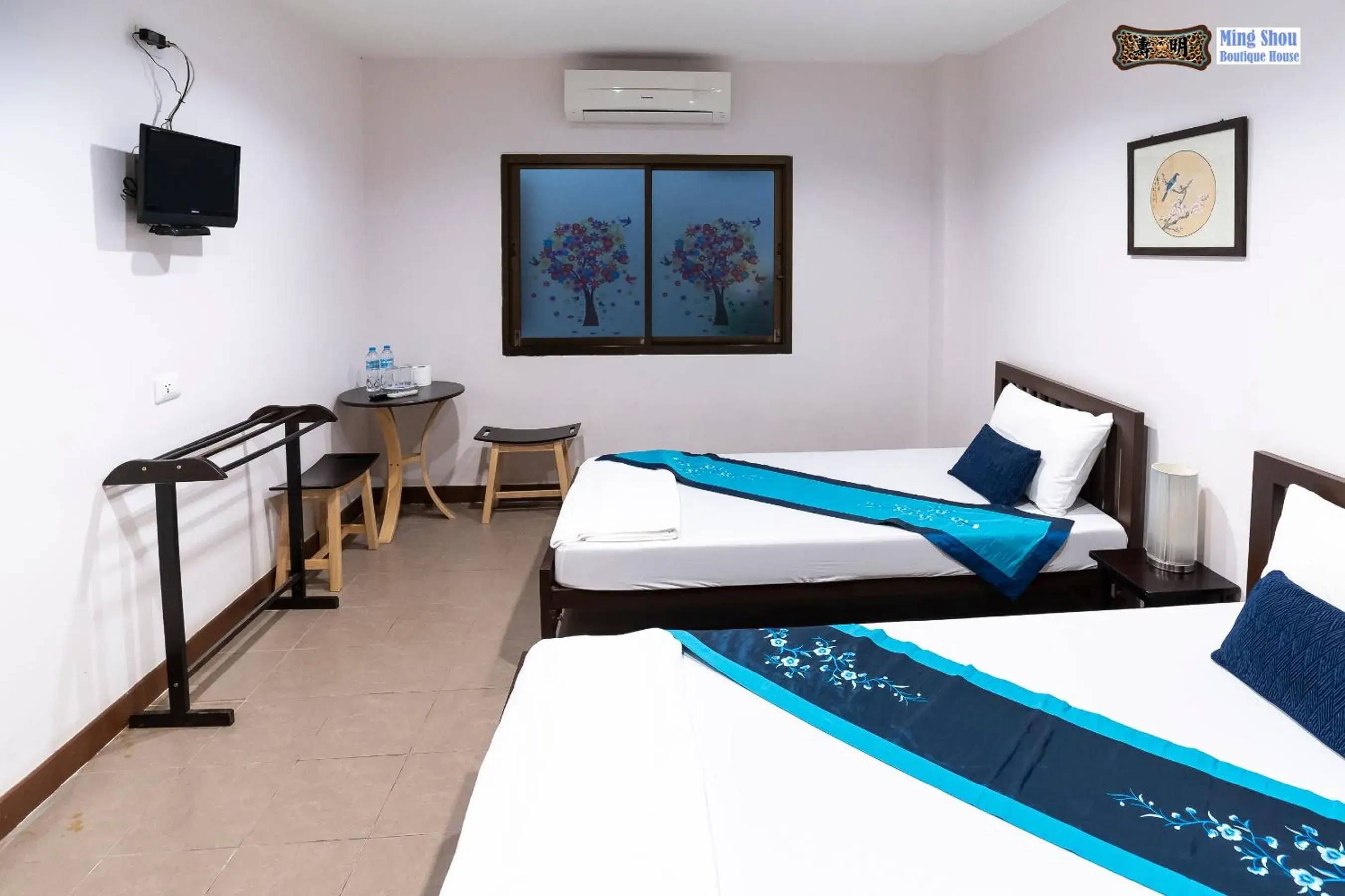 Bed in Ming Shou Boutique House Bed in Ming Shou Boutique House