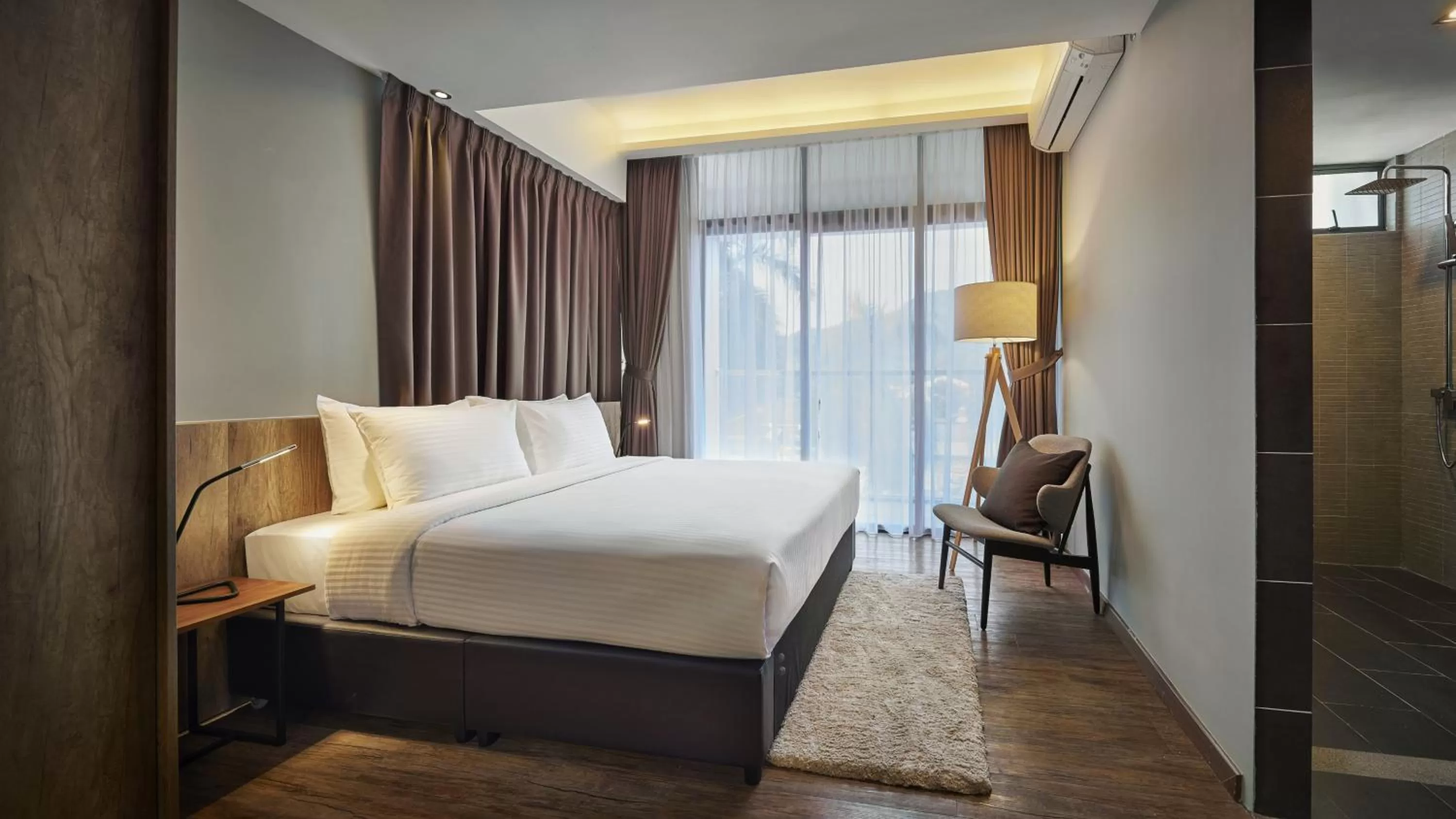 Bedroom in Tropics Eight Suites