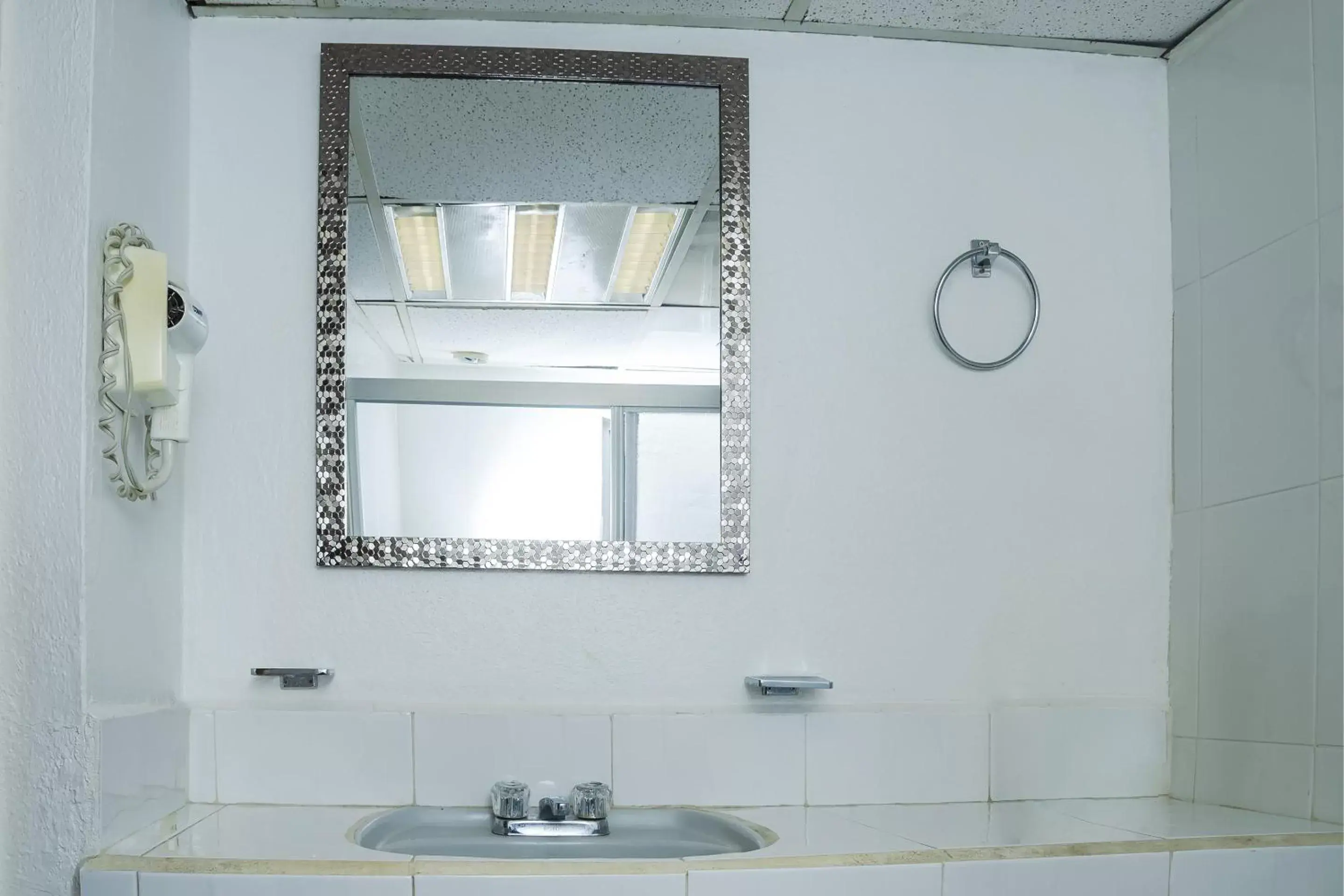 Bathroom in Capital O Hotel Dos Mares, Cabo San Lucas