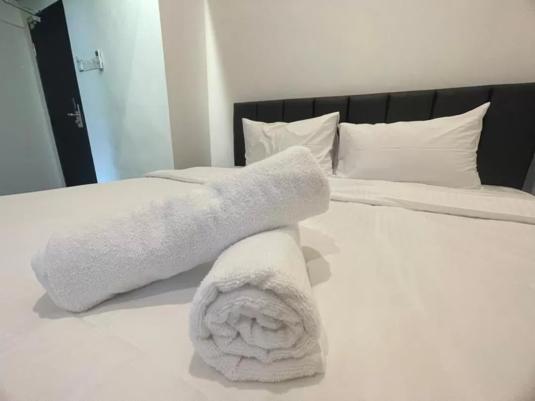 Bed in The Magazine Boutique Hotel