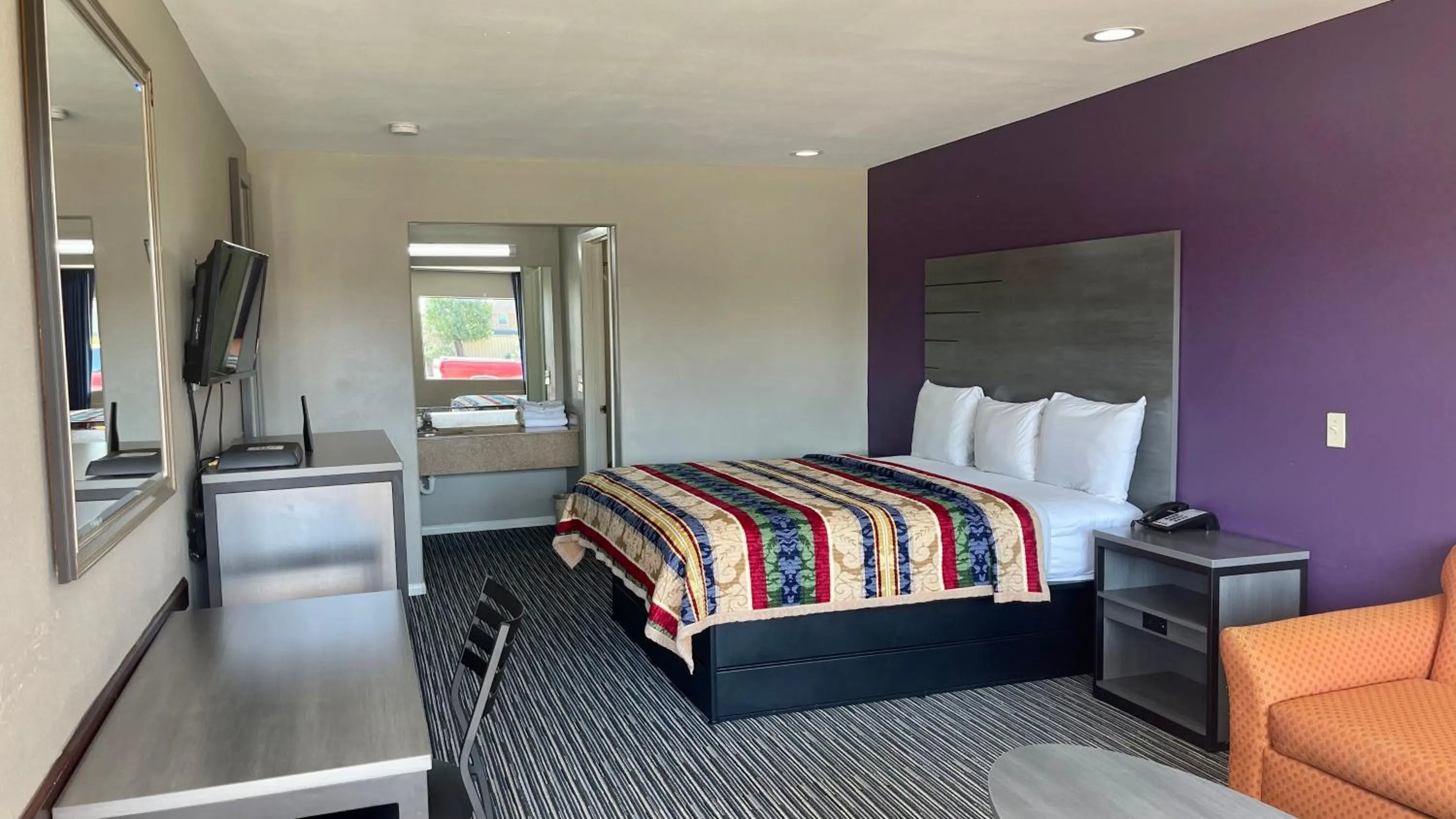 Bed in Executive Inn and Suites Houston