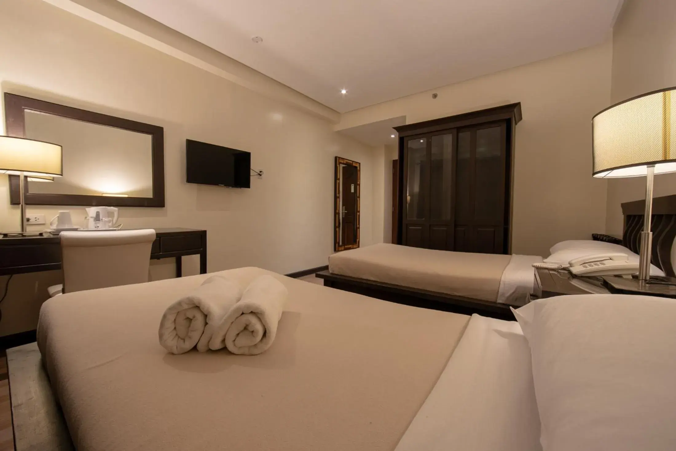 Bed in Rosvenil Hotel