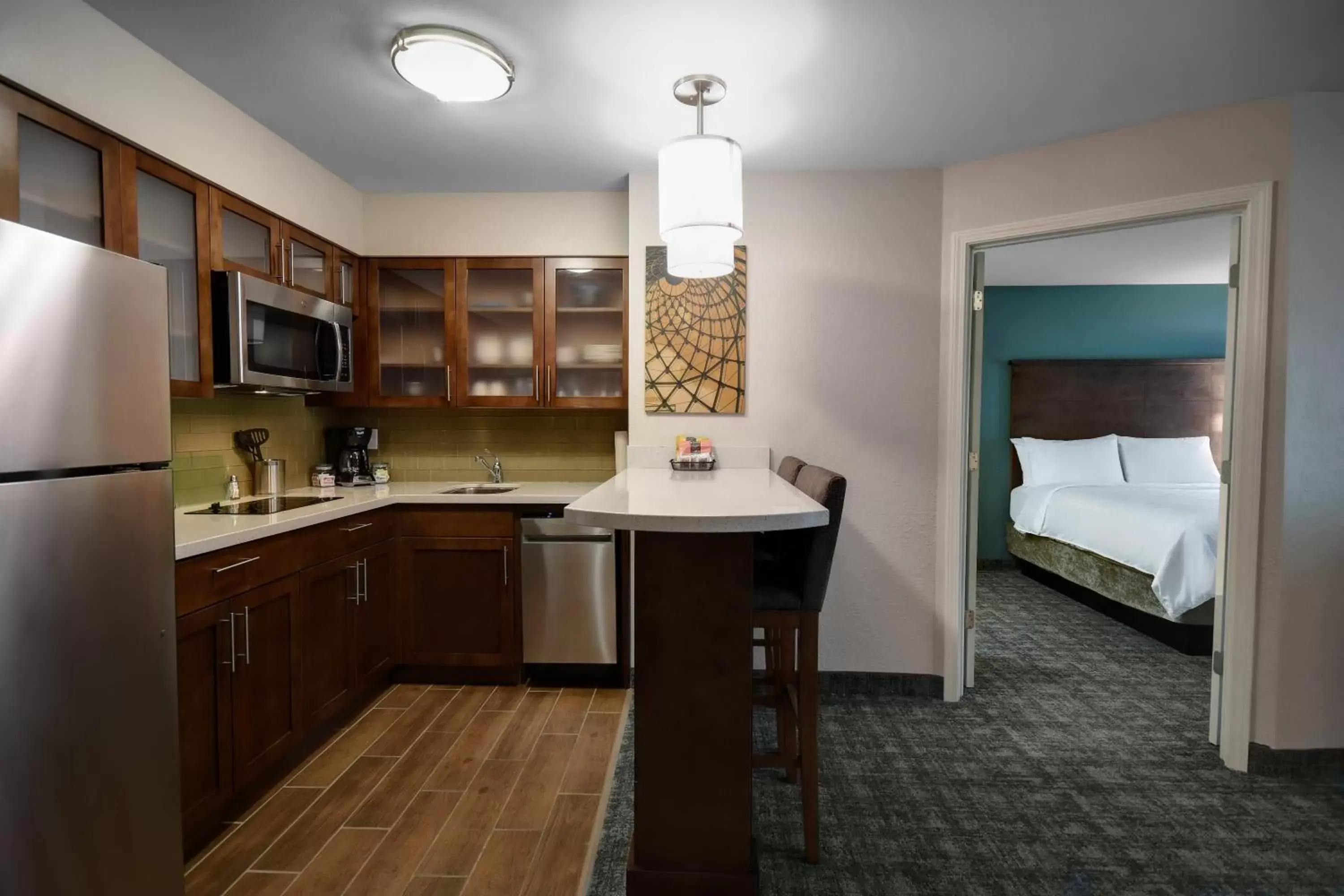 Photo of the whole room, Kitchen/Kitchenette in Staybridge Suites - Holland, an IHG Hotel