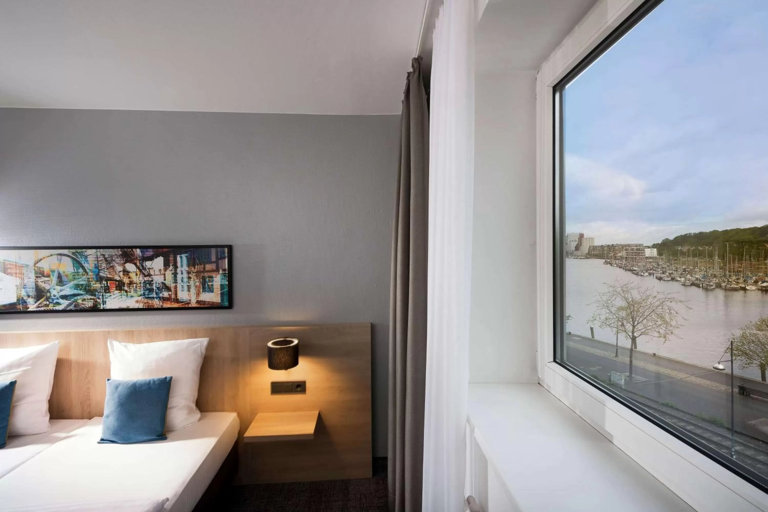 Photo of the whole room, Bed in Ramada by Wyndham Flensburg City