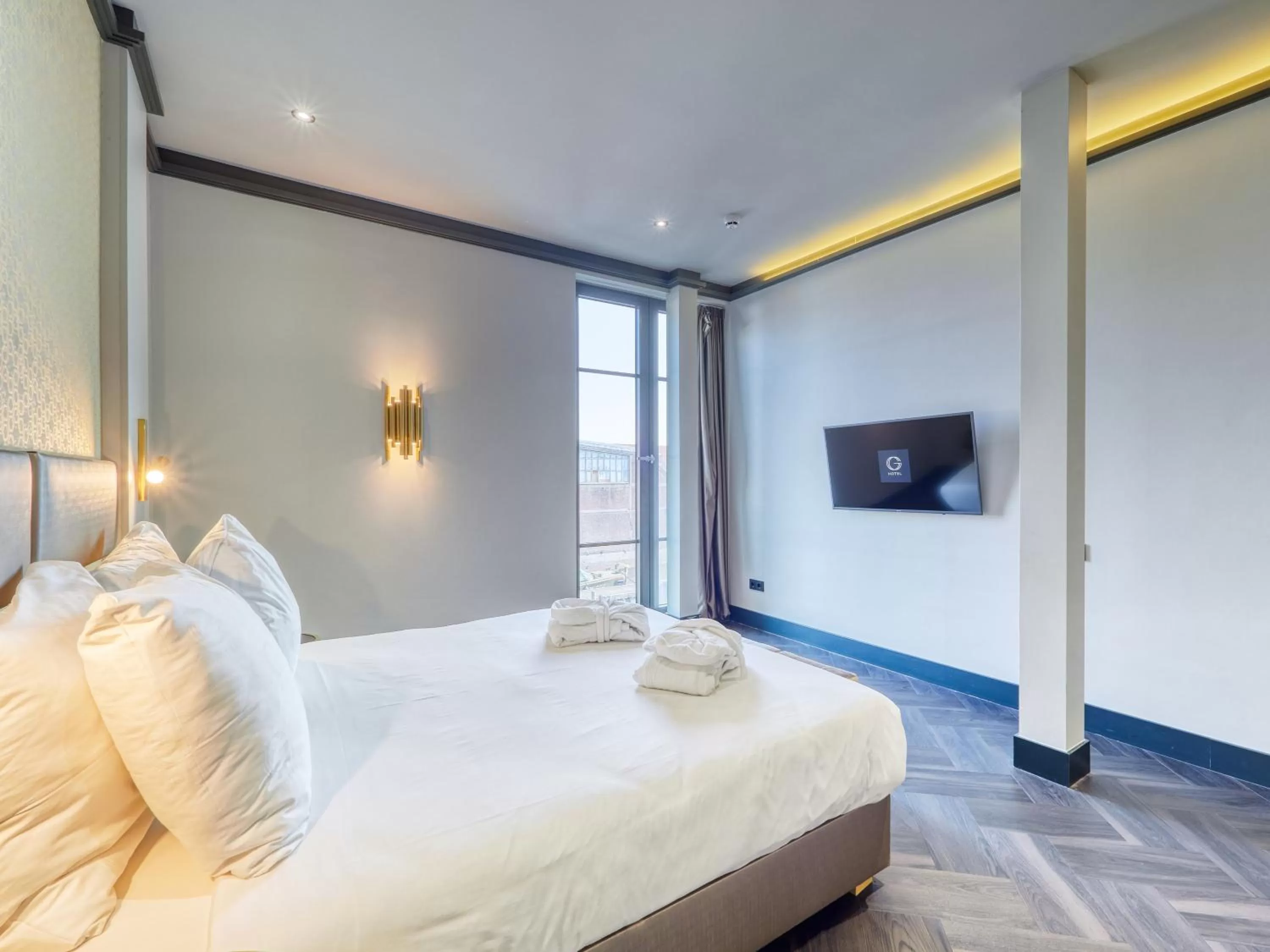 Photo of the whole room, Bed in Triple G Hotels