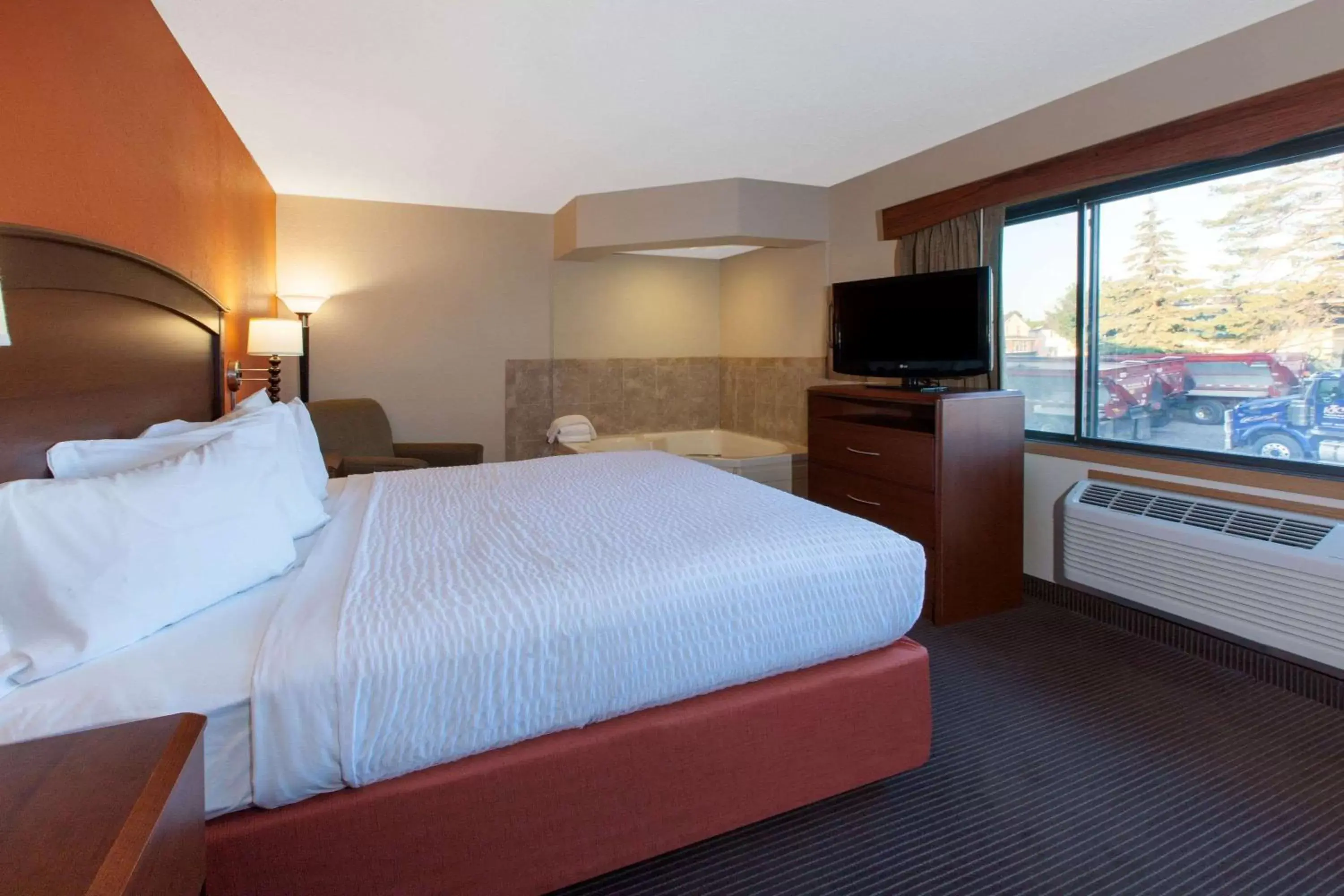 Photo of the whole room, Bed in AmericInn by Wyndham Iron River