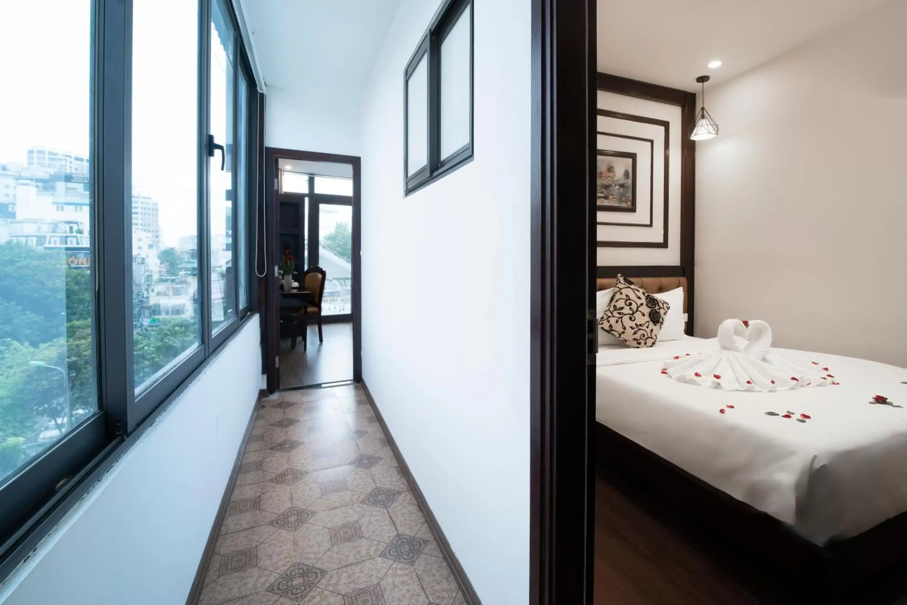 Balcony/Terrace, Bed in Le Beryl Hanoi Hotel