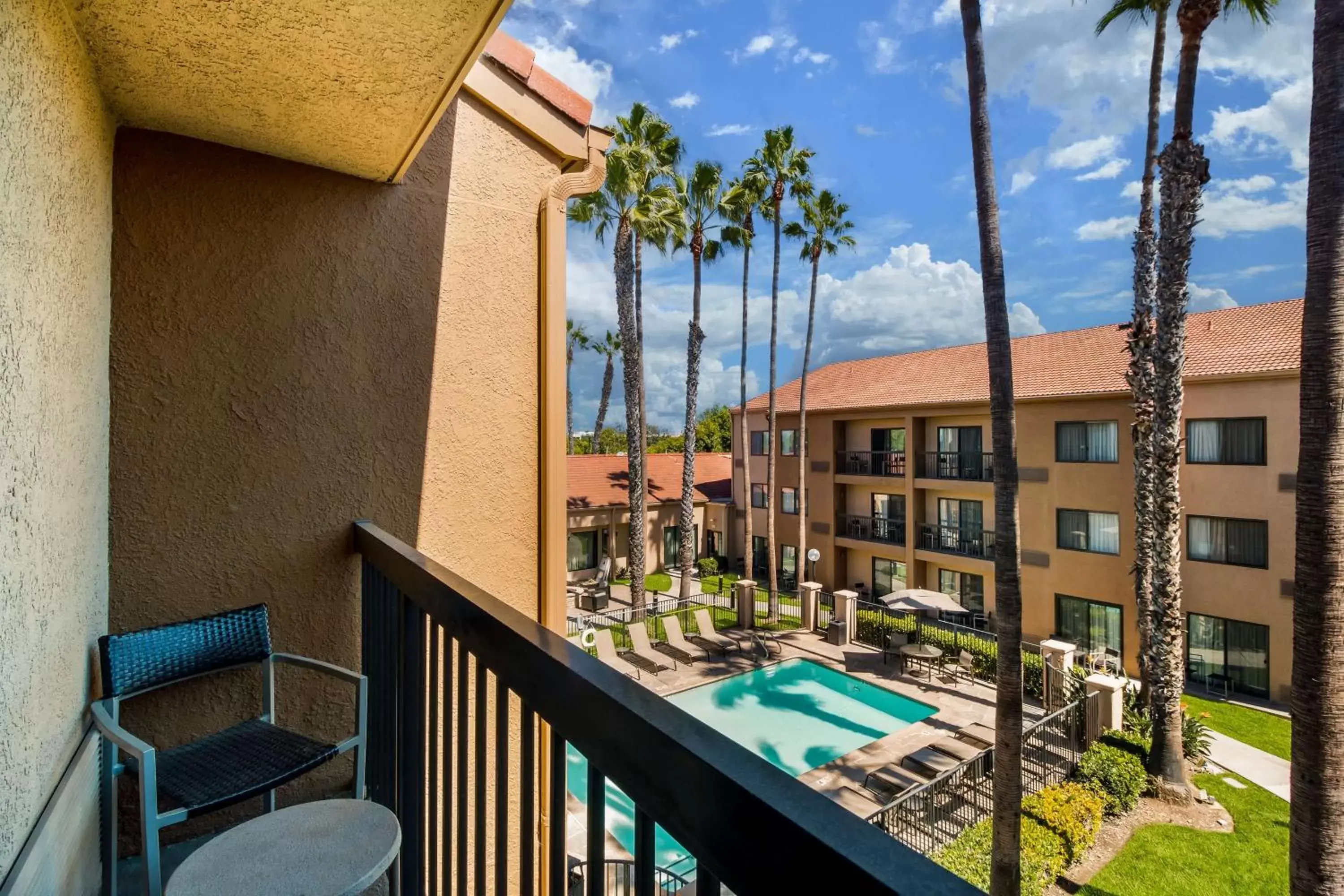 Bedroom, Pool View in Sonesta Select Huntington Beach Fountain Valley