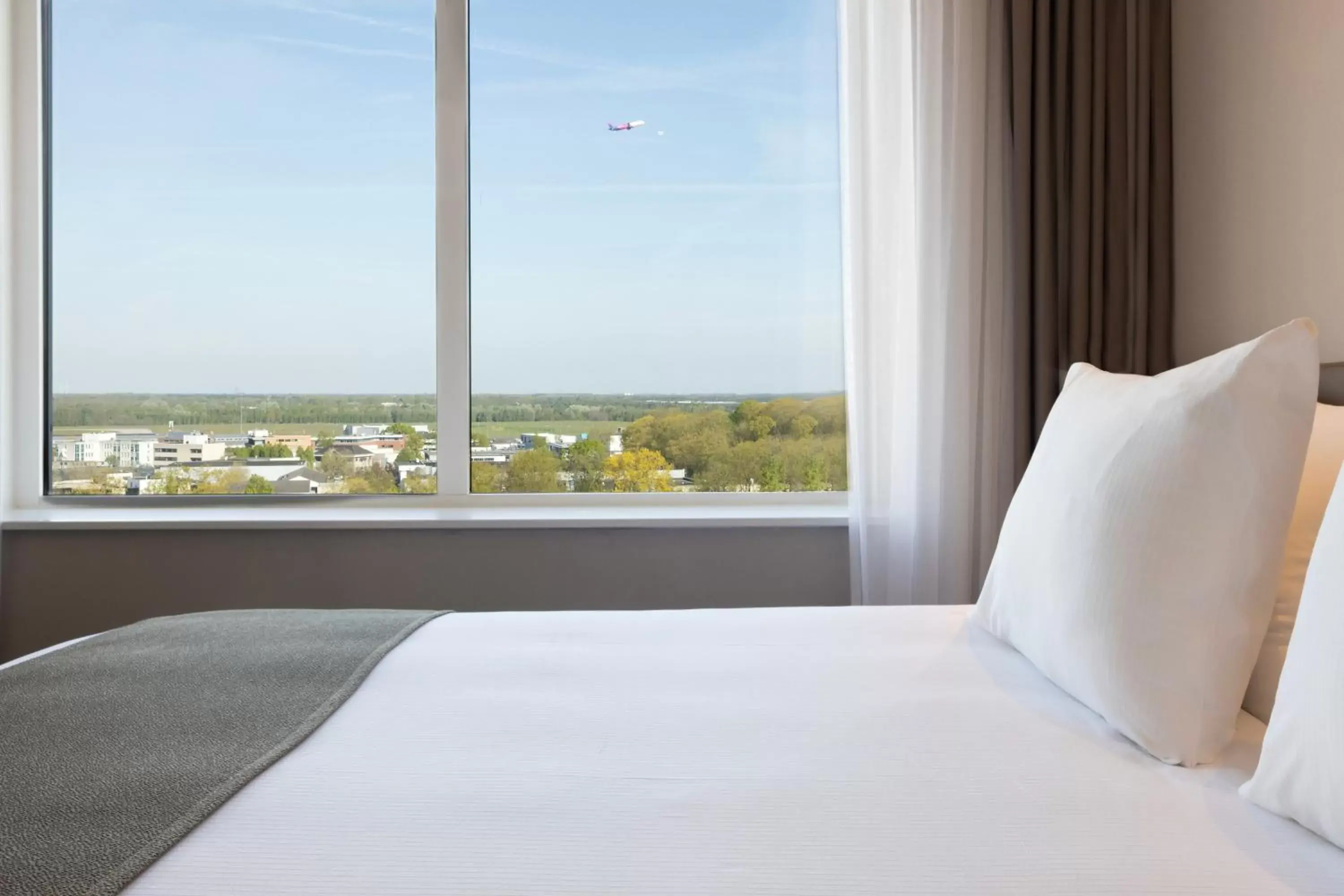 Bed in Holiday Inn - Eindhoven Airport, an IHG Hotel