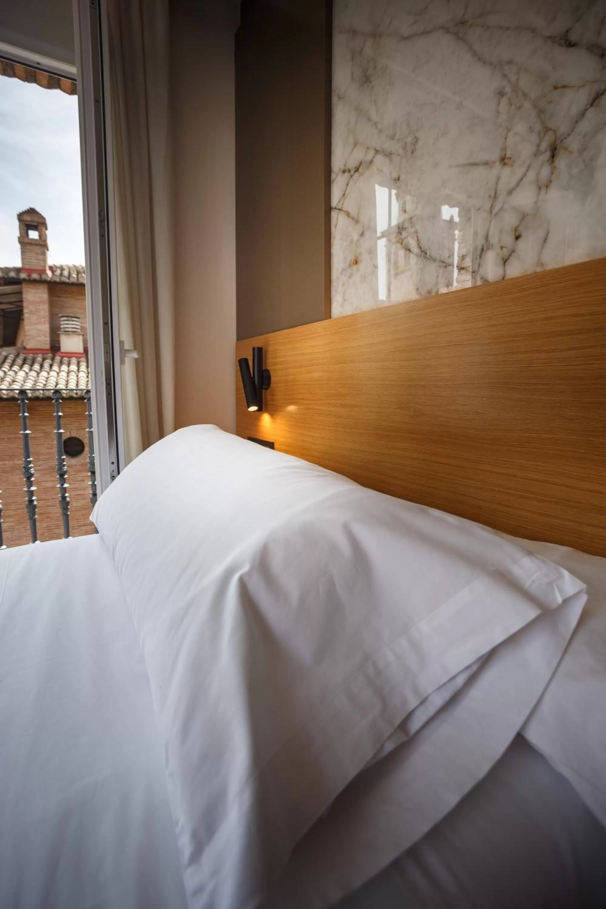 Decorative detail, Bed in Hotel Dauro Premier