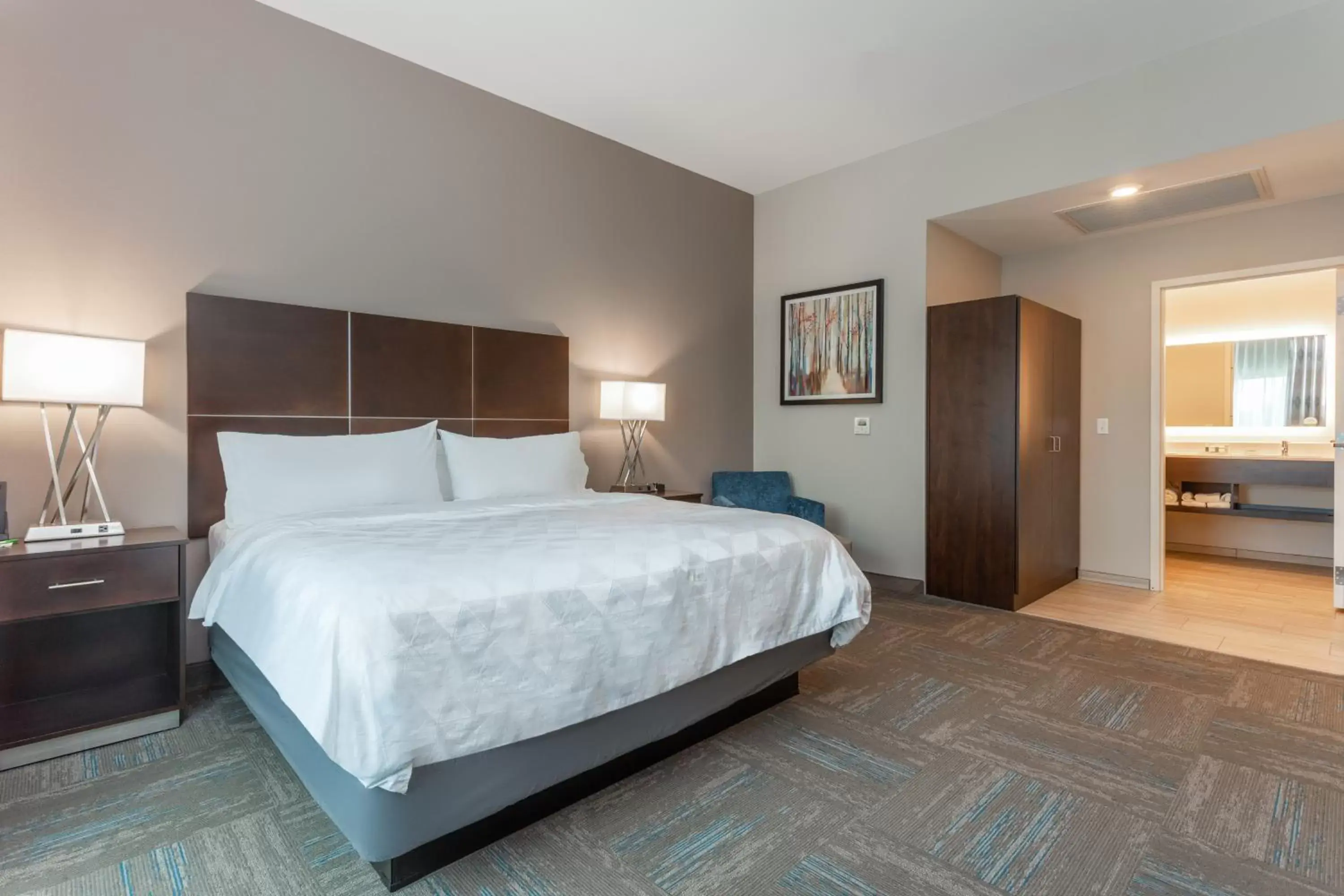 Bed in Holiday Inn & Suites - Jefferson City, an IHG Hotel