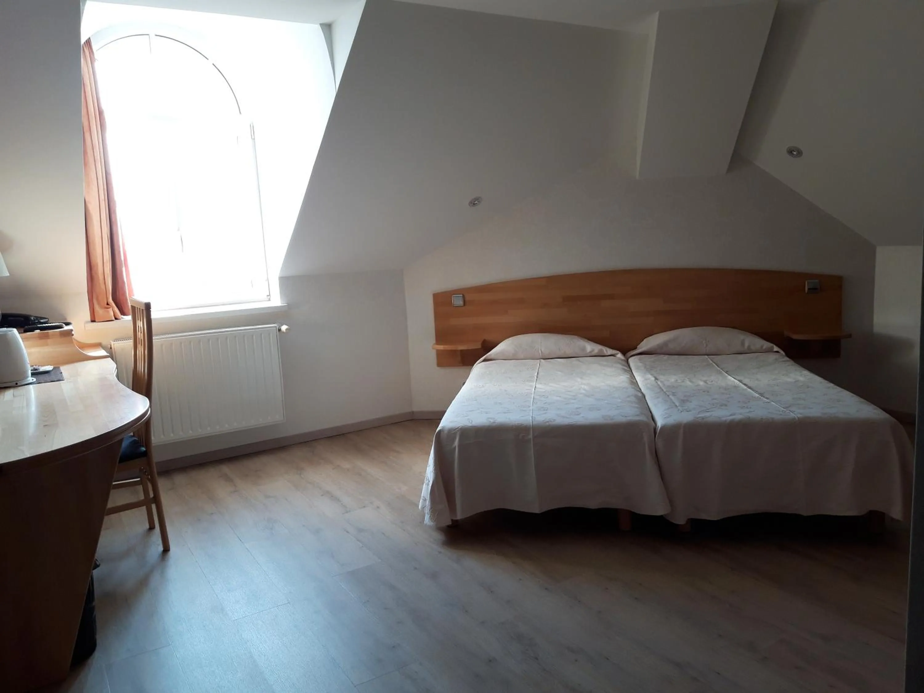 Bed in Hôtel la Guimbarde