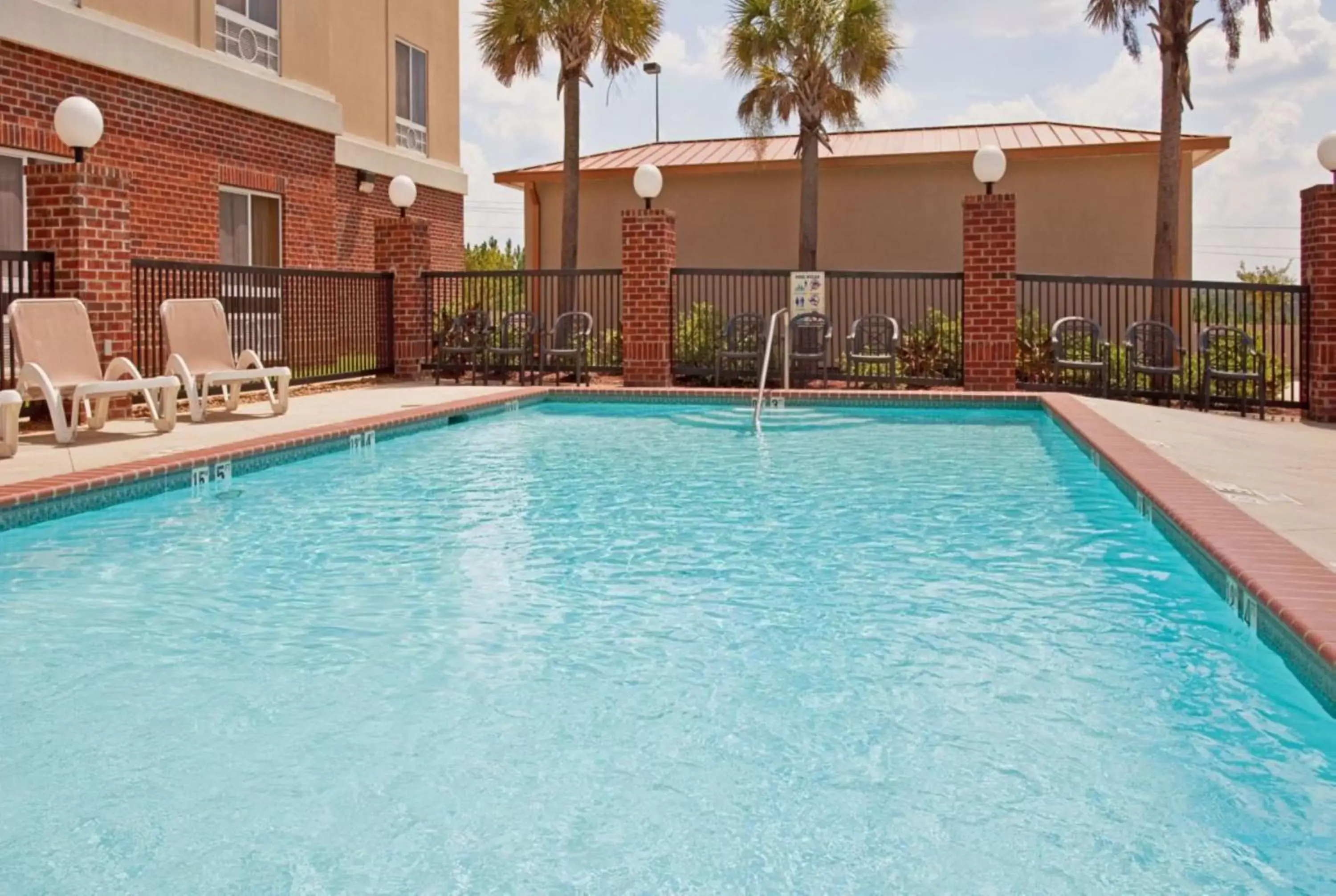 Swimming pool in Holiday Inn Express Hotel & Suites Lucedale, an IHG Hotel