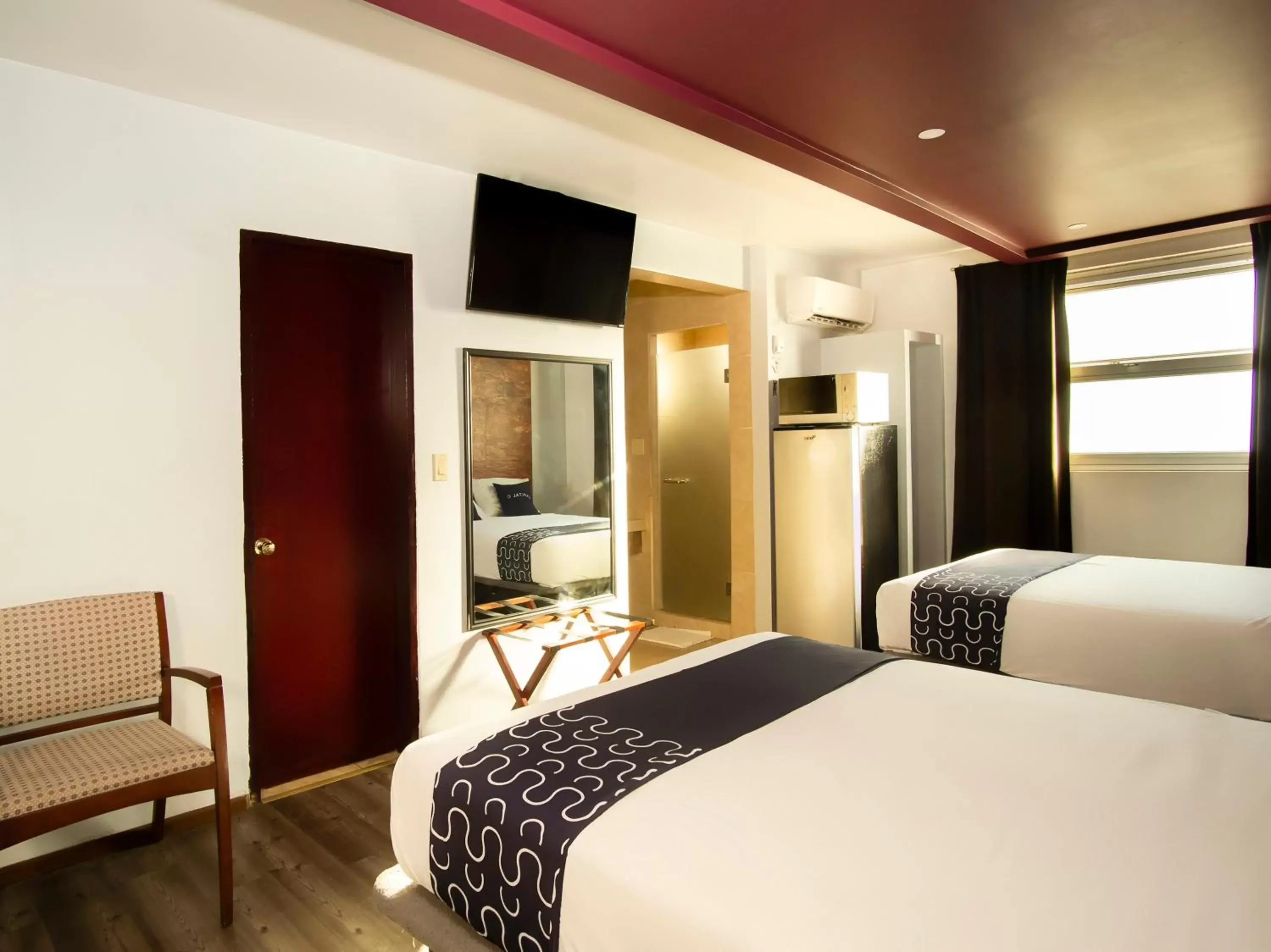 Bedroom in CAPITAL O Hotel Rose, Ensenada
