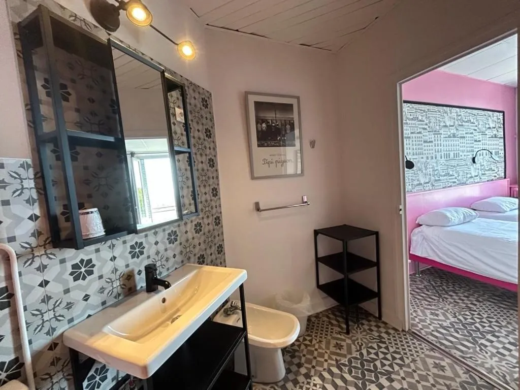 Bed in Hôtel de la Croix-Rousse