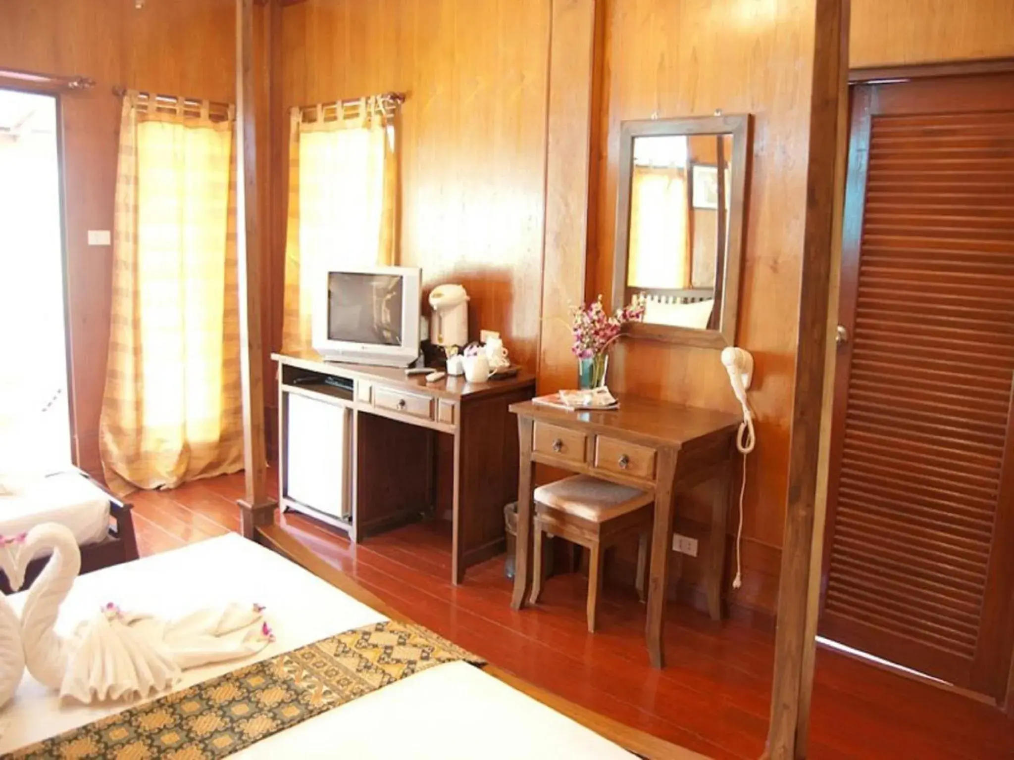 Photo of the whole room, TV/Entertainment Center in Sayang Beach Resort Koh Lanta