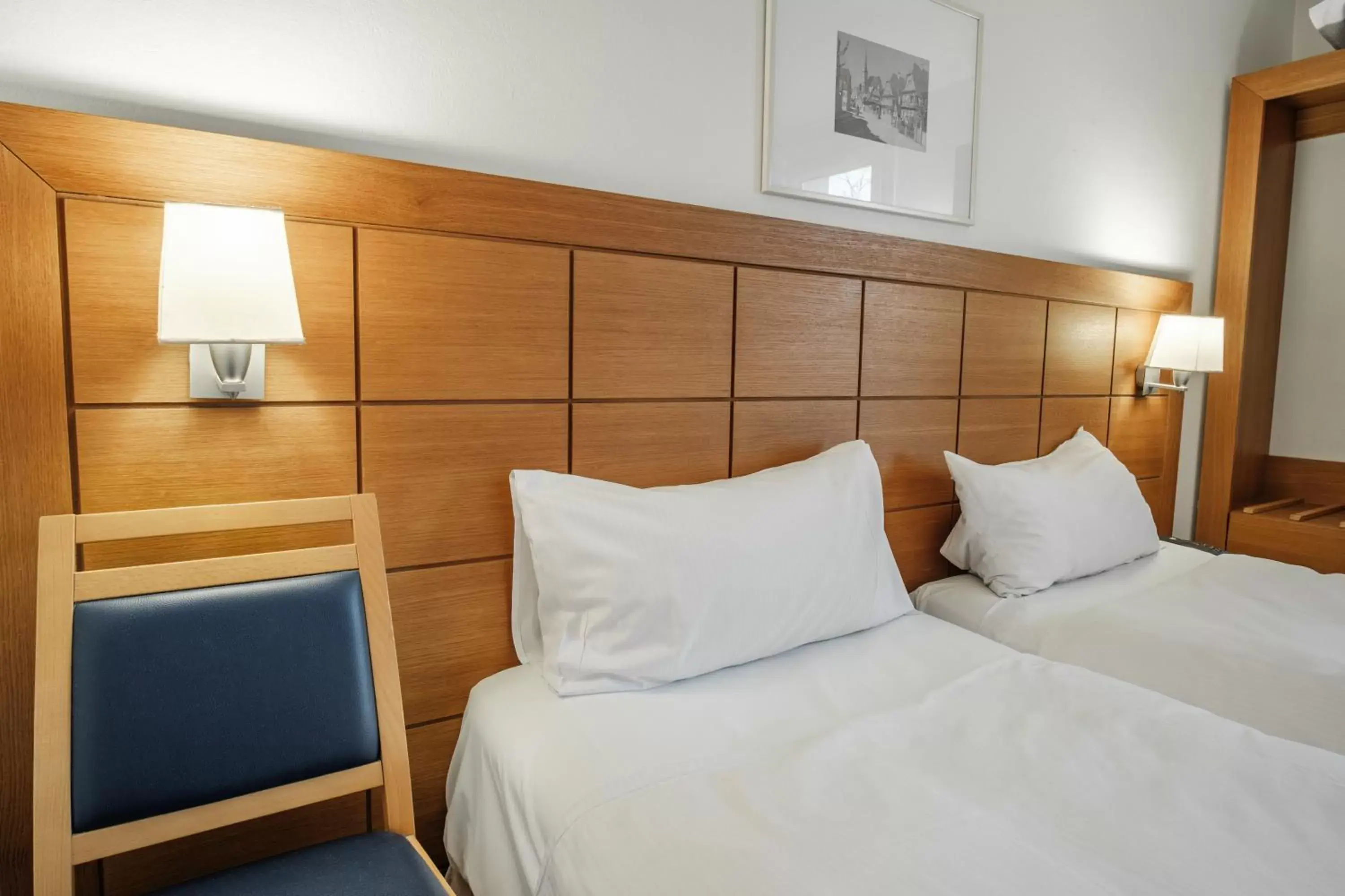 Bedroom, Bed in Hotel Strasbourg - Montagne Verte & Restaurant Louisiane