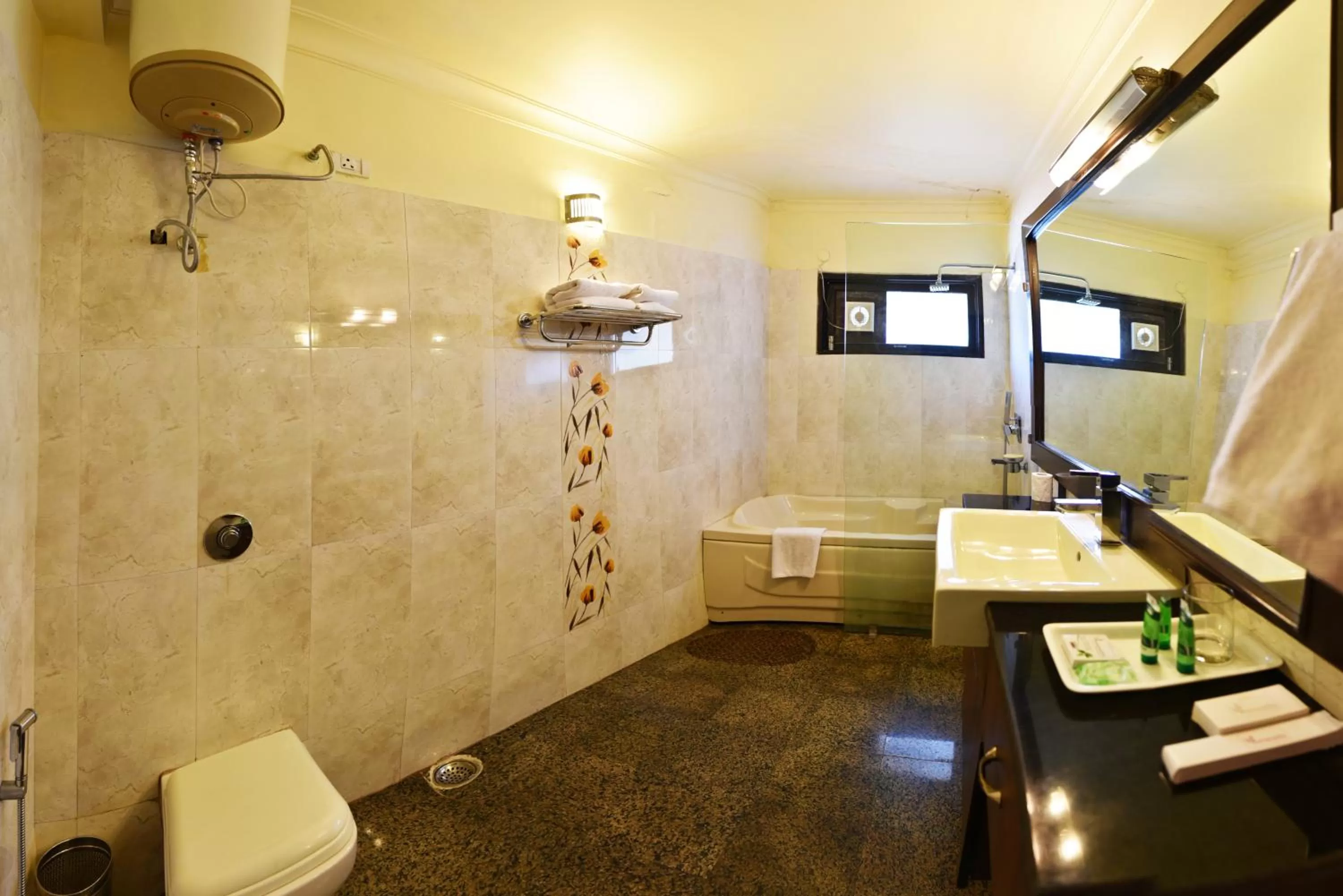 Bathroom in Indraprastha Resort - Centrally Heated Rooms, with Gym, Games & Spa
