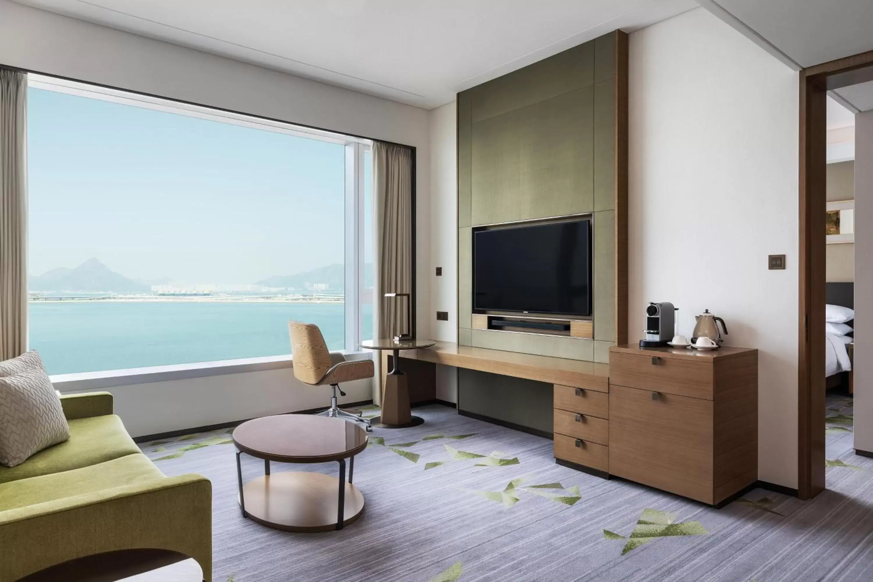 Living room, TV/Entertainment Center in Sheraton Hong Kong Tung Chung Hotel