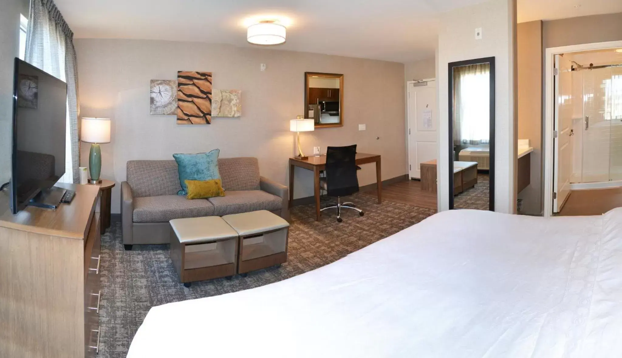 Photo of the whole room, Seating Area in Staybridge Suites - Red Deer North, an IHG Hotel