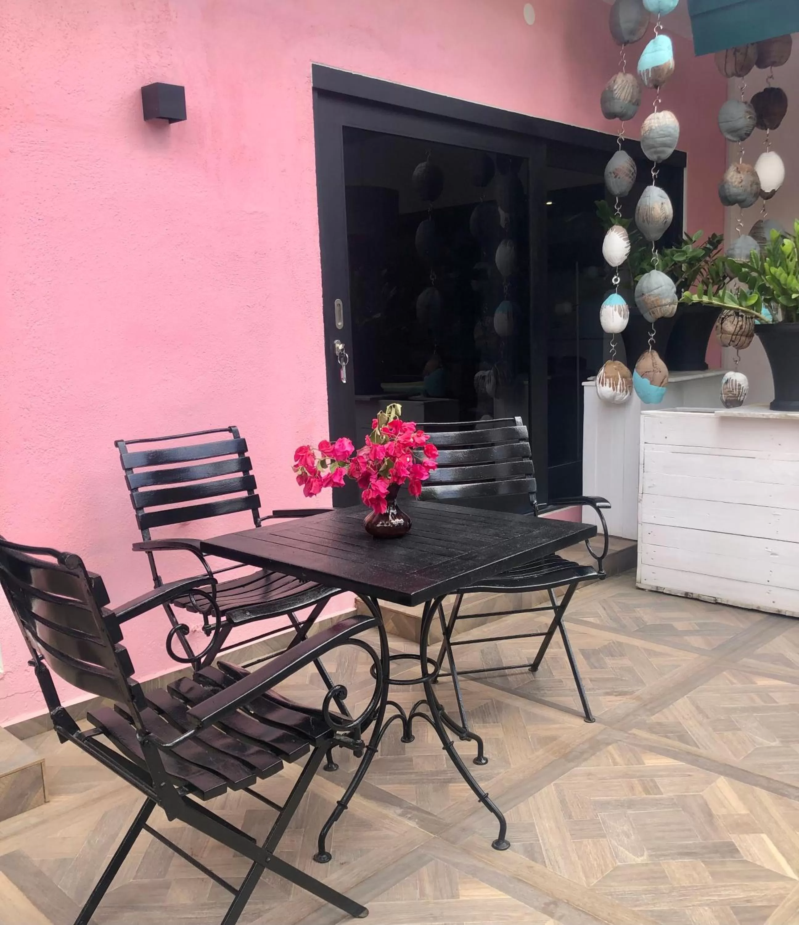 Patio in THUISHAVEN boutique mini-resort - fantastic garden and large pool - adults only