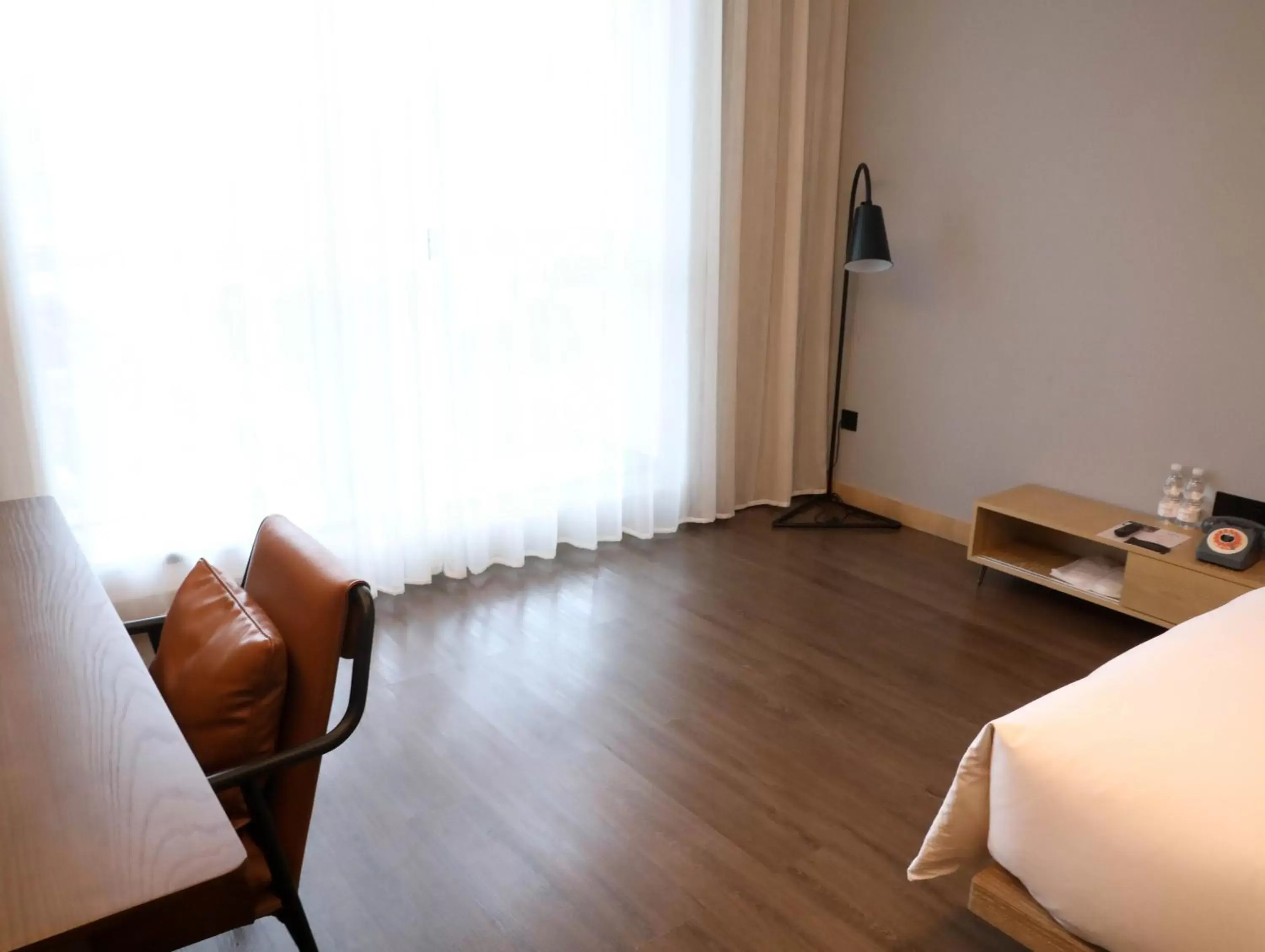 Bed, Seating Area in Moxy Shenzhen North Station