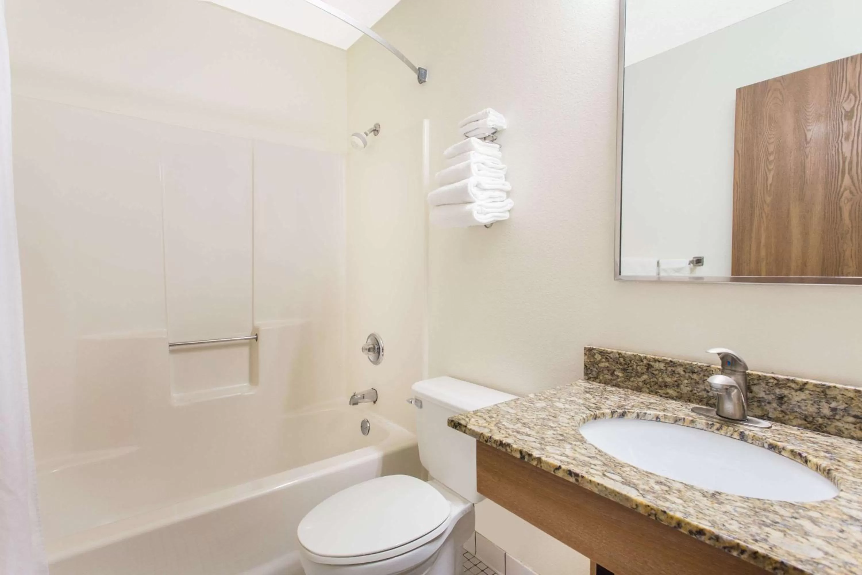 Bathroom in Days Inn by Wyndham Austin