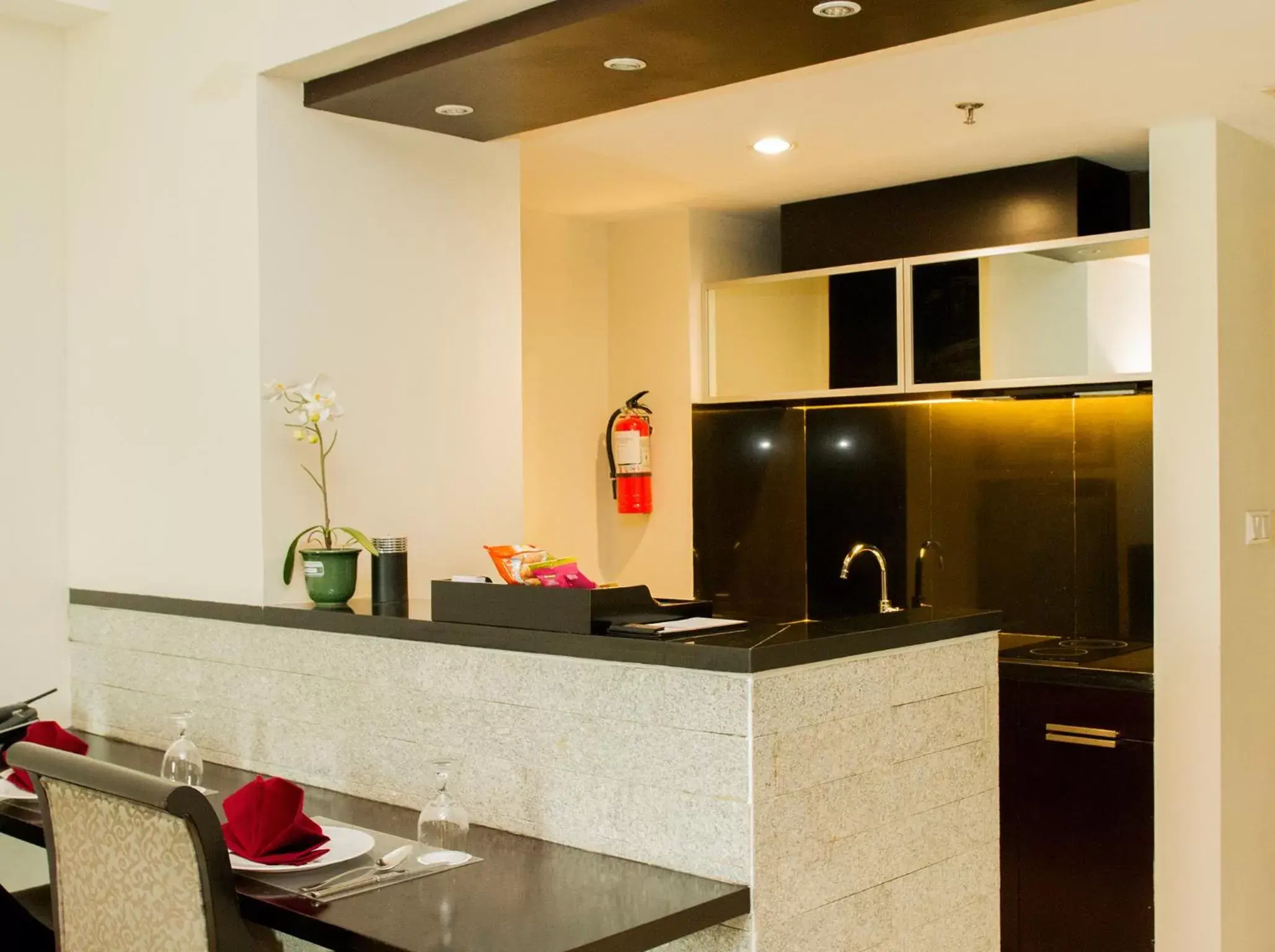 Kitchen or kitchenette, Kitchen/Kitchenette in Grandkemang Hotel