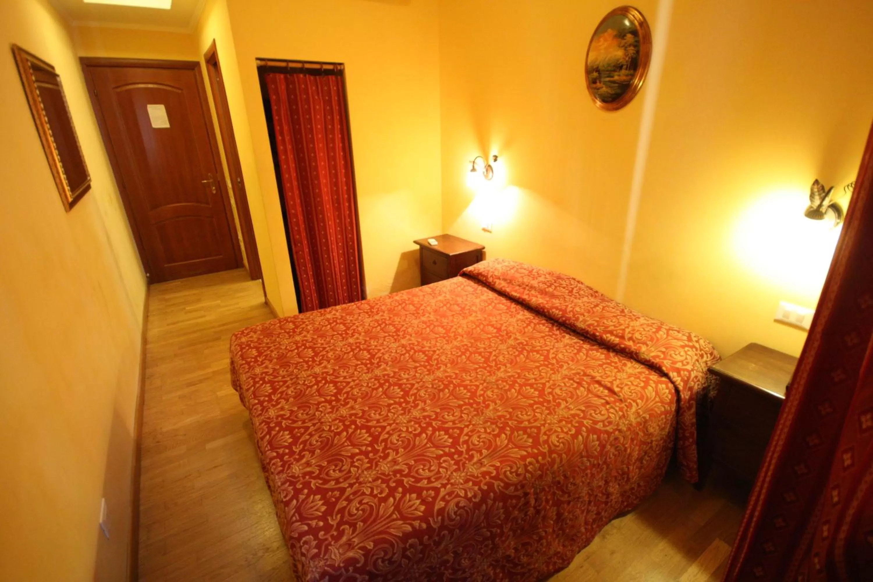 Bed in Hotel Cherubini