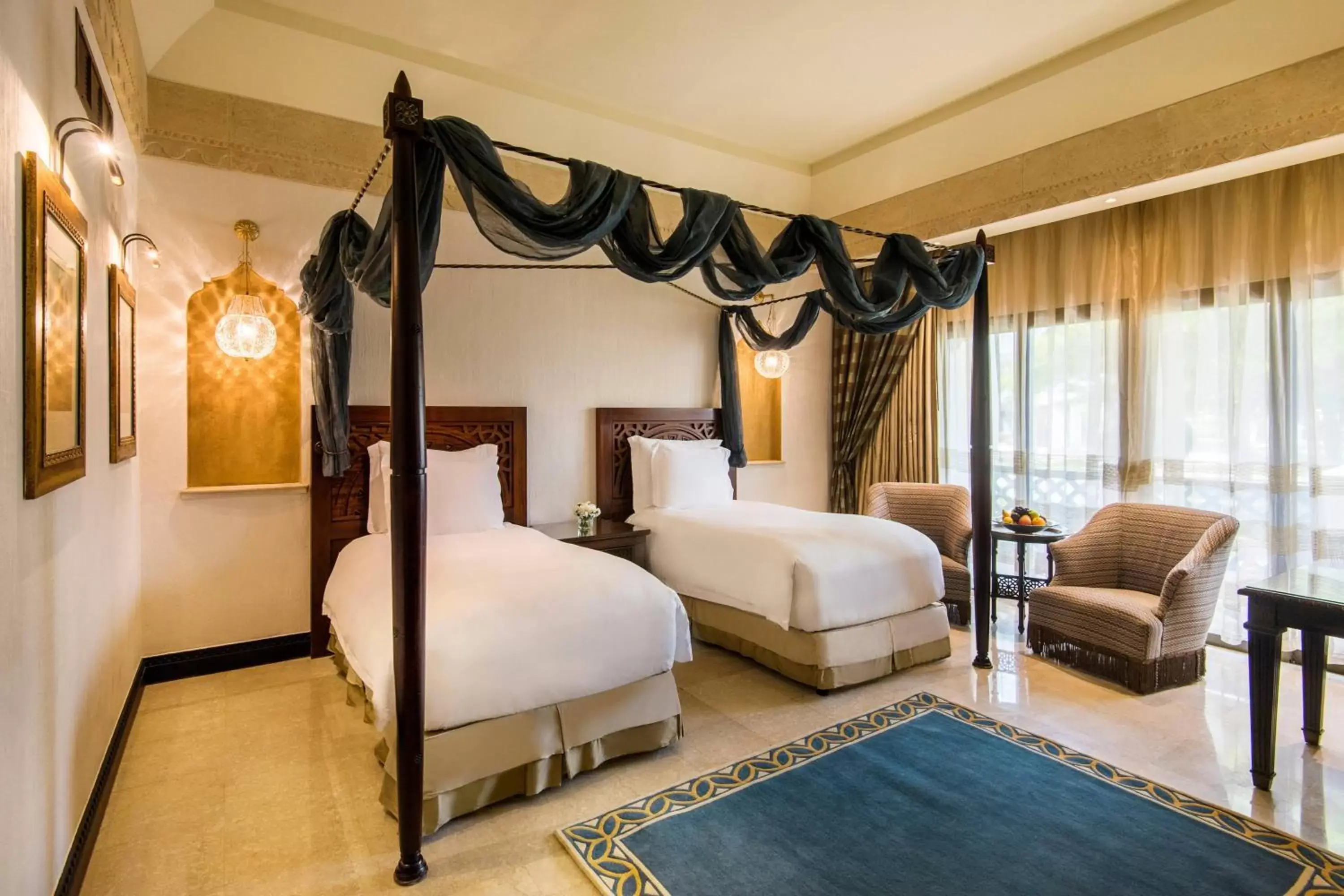 Photo of the whole room, Bed in Sharq Village & Spa, a Ritz-Carlton Hotel