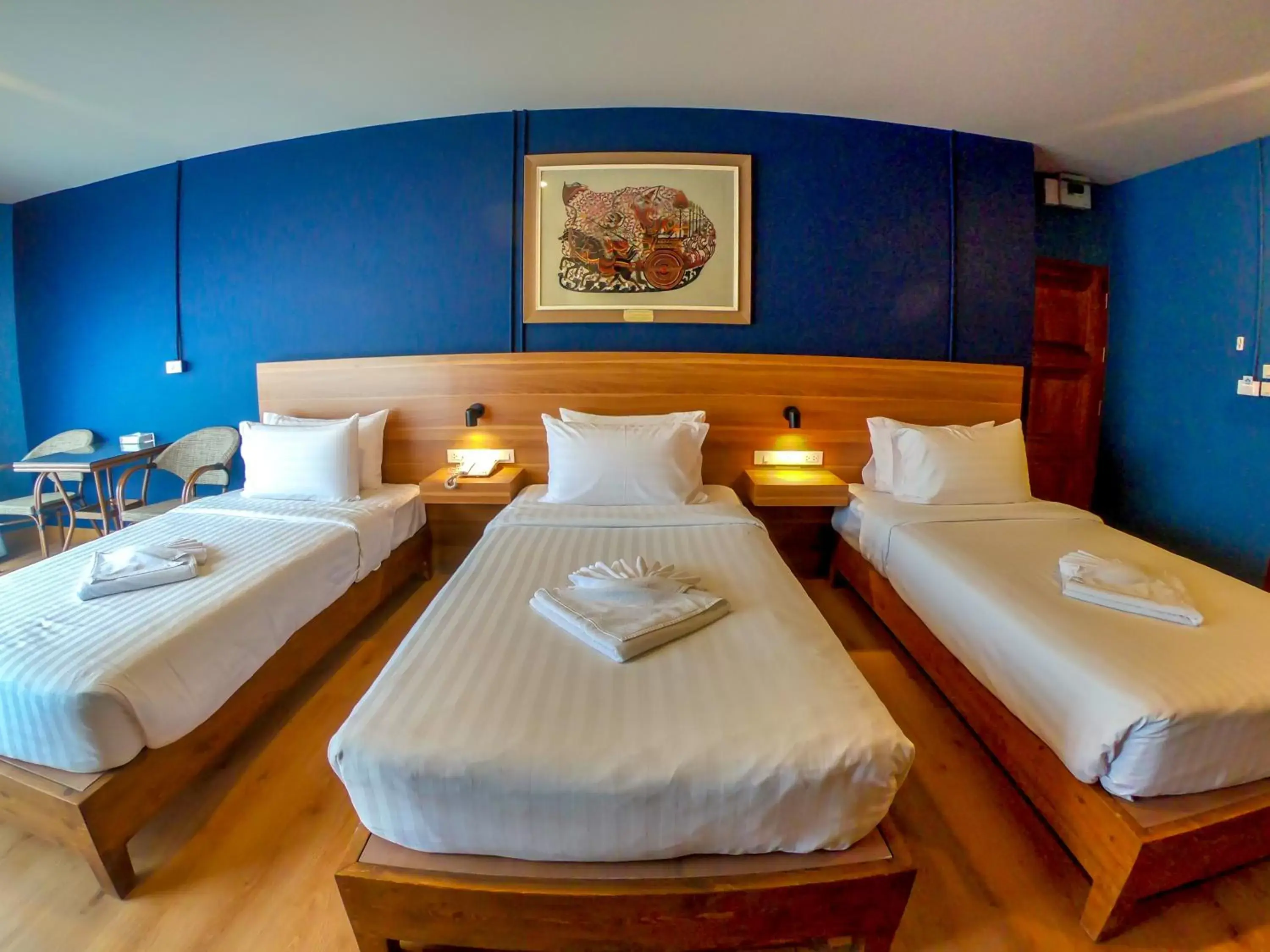 Bed in Siri Oriental Bangkok Hotel - SHA Extra Plus