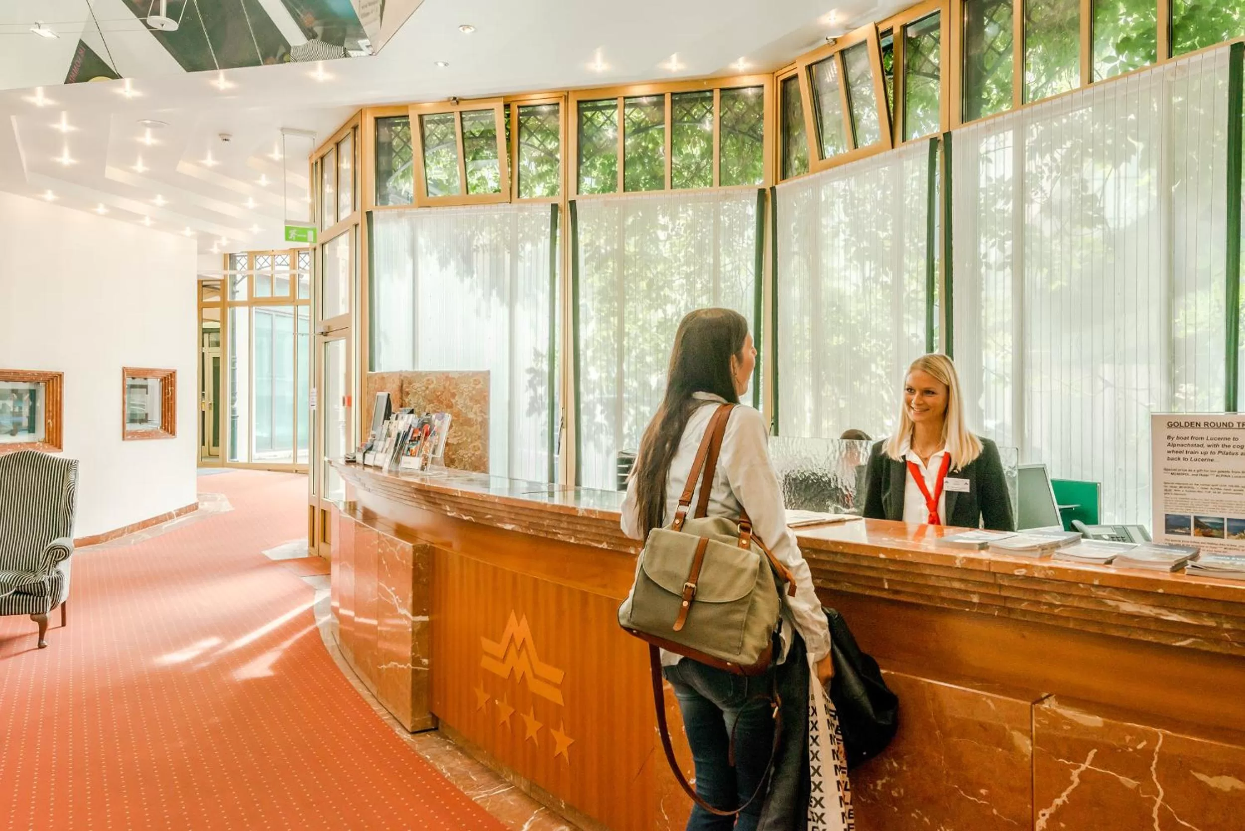 Lobby or reception in Hotel Monopol Luzern