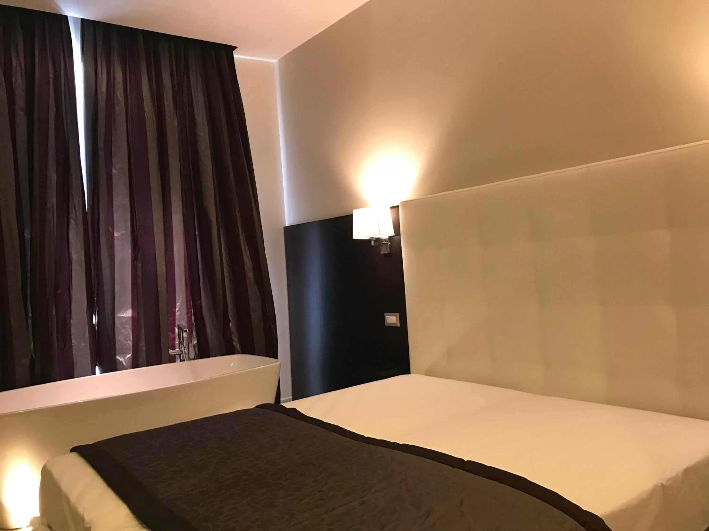 Photo of the whole room, Bed in Roman Holidays Boutique Hotel