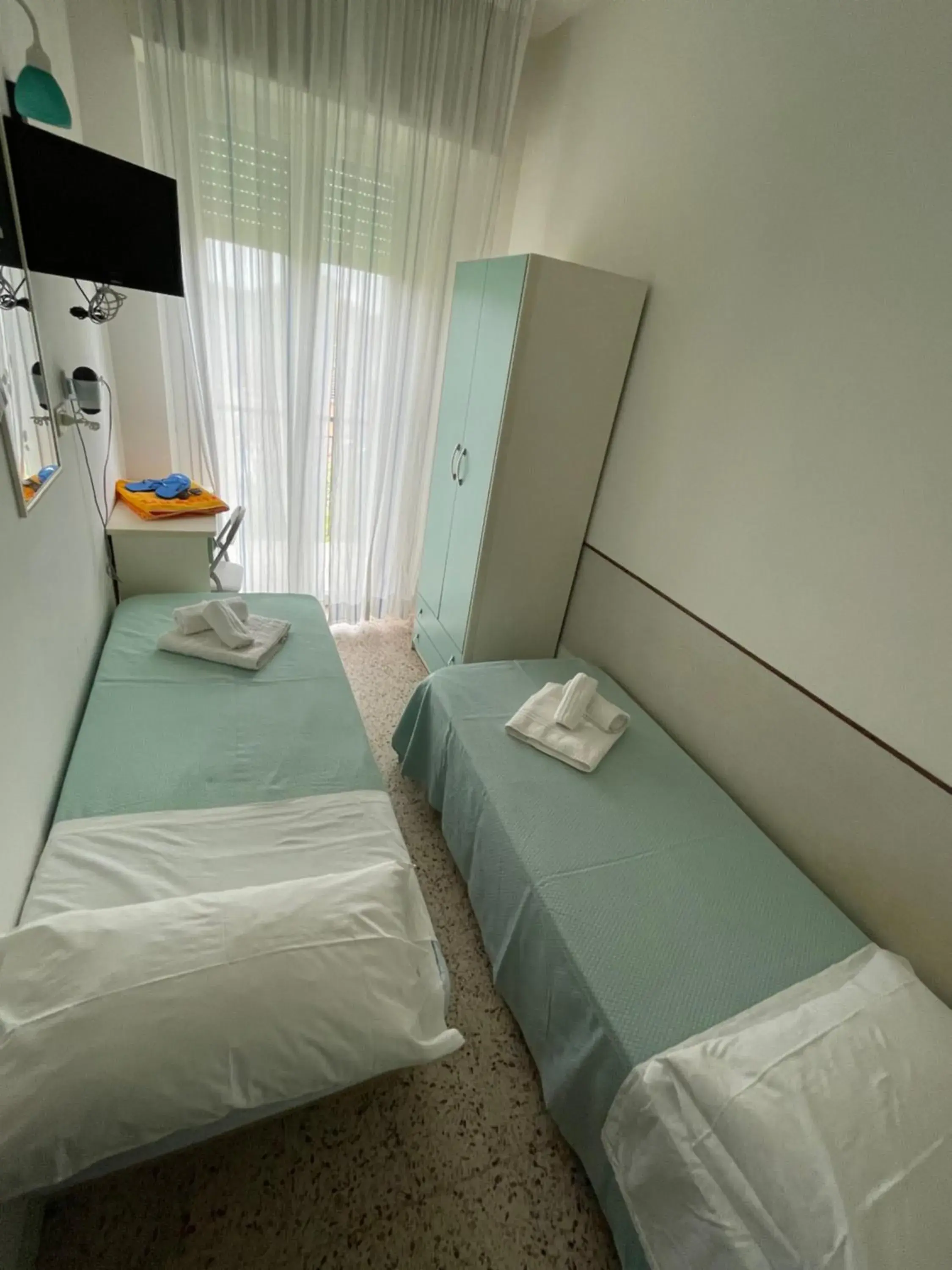Bed in Hotel Urania