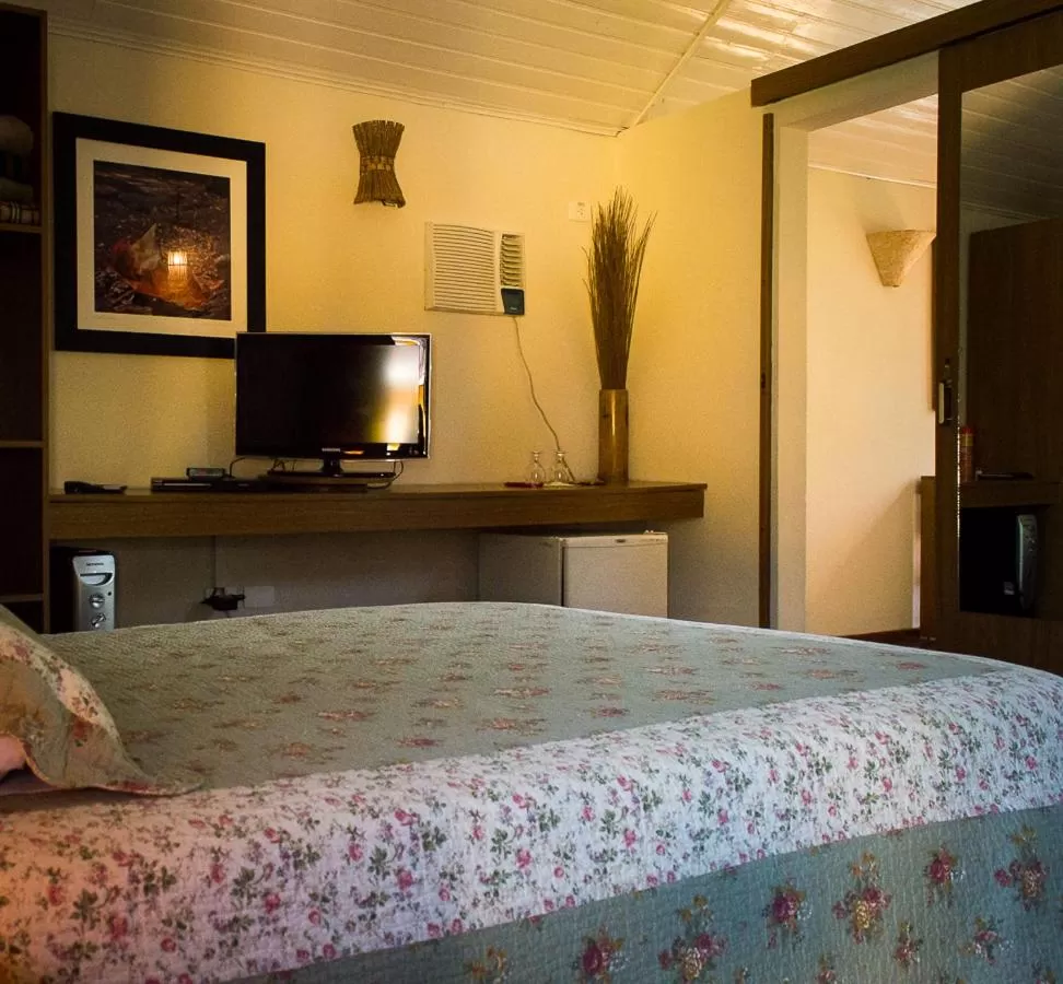 Photo of the whole room, Bed in Pousada Vila Santa Barbara