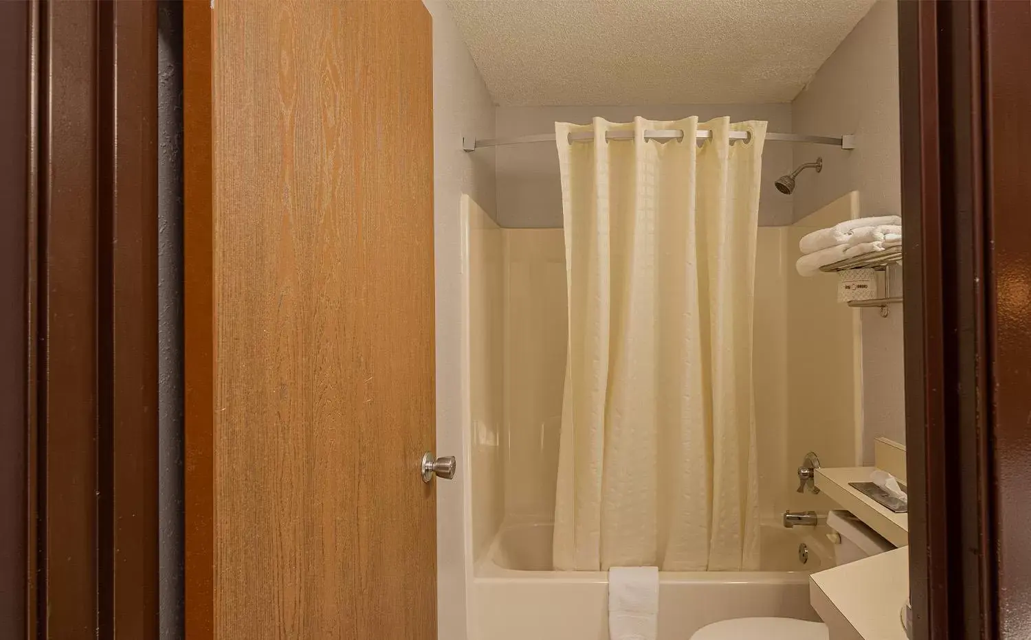 Bathroom in Coratel Inn & Suites by Jasper Hastings