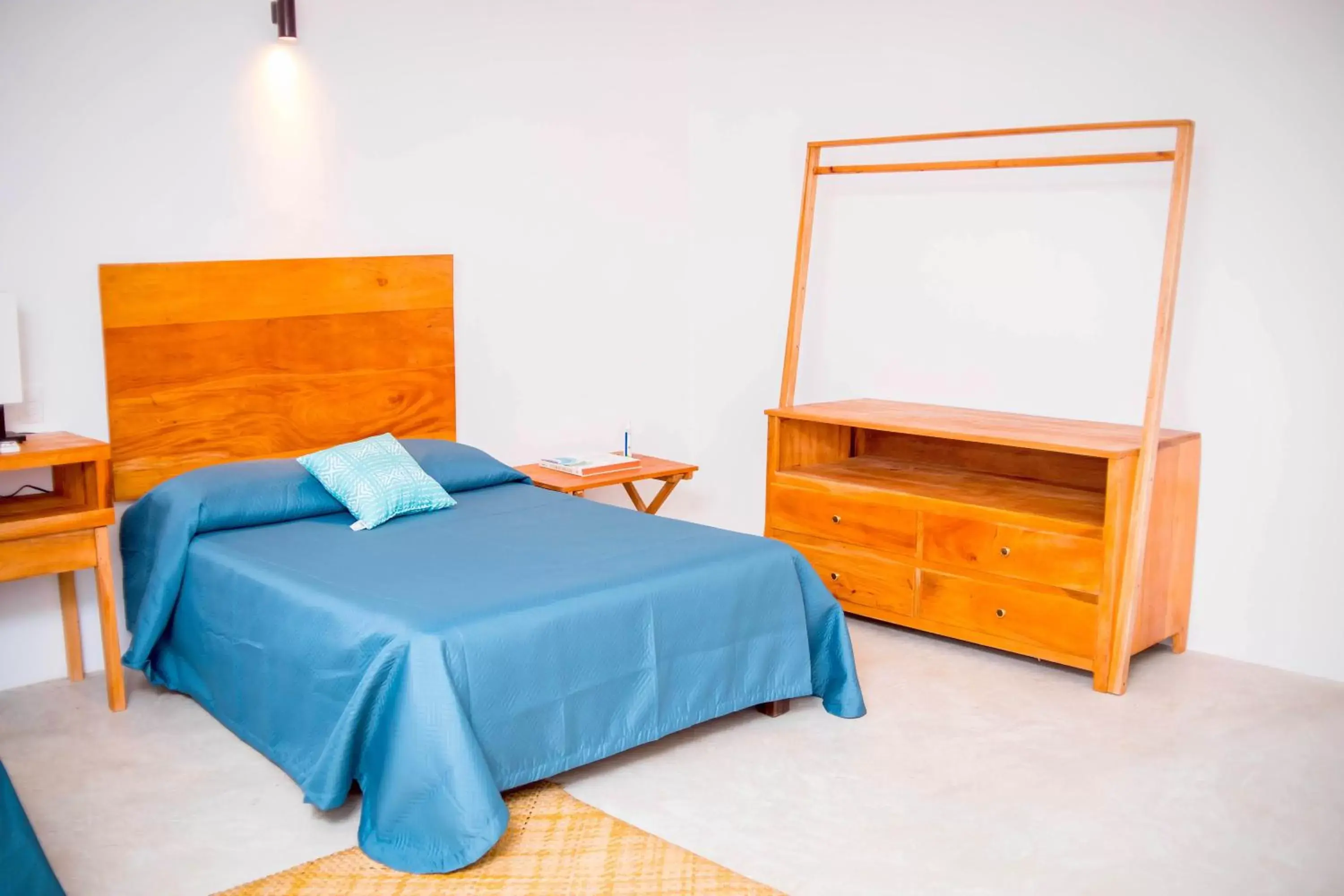 Bed in Royal Palm Bacalar Cabañas & Lagoon Club